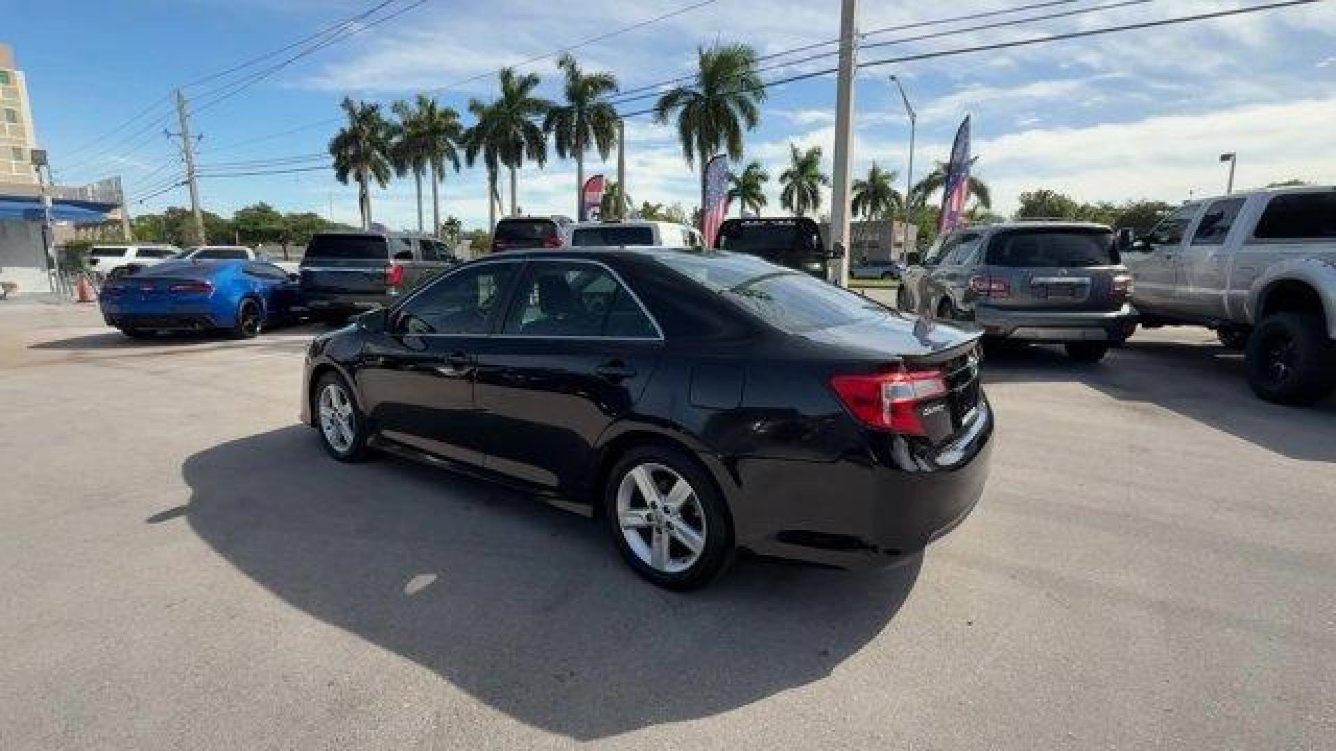 2014 Black Toyota Camry (4T1BF1FK1EU) with an 4 2.5 L engine, Automatic transmission, located at 27610 S Dixie Hwy, Homestead, FL, 33032, (305) 749-2348, 25.510241, -80.438301 - KBB.com 10 Best Hybrid Cars Under $30,000. Only 101,356 Miles! Delivers 35 Highway MPG and 25 City MPG! This Toyota Camry delivers a Regular Unleaded I-4 2.5 L/152 engine powering this Automatic transmission. Window Grid Antenna, Valet Function, Trunk Rear Cargo Access.*This Toyota Camry Comes Equip - Photo#2