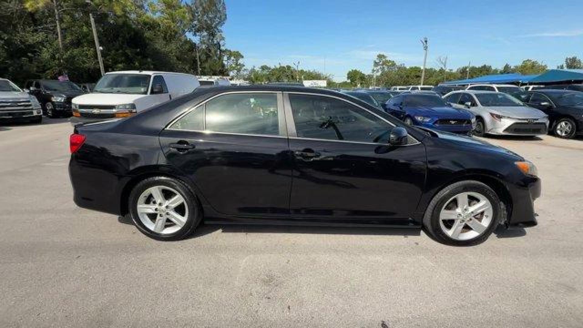 2014 Black Toyota Camry (4T1BF1FK1EU) with an 4 2.5 L engine, Automatic transmission, located at 27610 S Dixie Hwy, Homestead, FL, 33032, (305) 749-2348, 25.510241, -80.438301 - KBB.com 10 Best Hybrid Cars Under $30,000. Only 101,356 Miles! Delivers 35 Highway MPG and 25 City MPG! This Toyota Camry delivers a Regular Unleaded I-4 2.5 L/152 engine powering this Automatic transmission. Window Grid Antenna, Valet Function, Trunk Rear Cargo Access.*This Toyota Camry Comes Equip - Photo#5