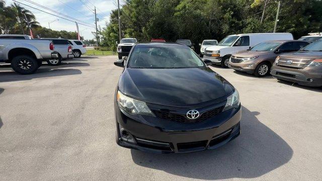 2014 Black Toyota Camry (4T1BF1FK1EU) with an 4 2.5 L engine, Automatic transmission, located at 27610 S Dixie Hwy, Homestead, FL, 33032, (305) 749-2348, 25.510241, -80.438301 - KBB.com 10 Best Hybrid Cars Under $30,000. Only 101,356 Miles! Delivers 35 Highway MPG and 25 City MPG! This Toyota Camry delivers a Regular Unleaded I-4 2.5 L/152 engine powering this Automatic transmission. Window Grid Antenna, Valet Function, Trunk Rear Cargo Access.*This Toyota Camry Comes Equip - Photo#7