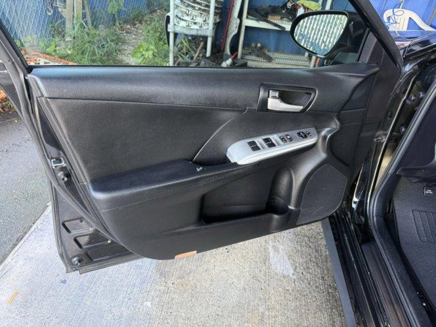 2014 Black Toyota Camry (4T1BF1FK1EU) with an 4 2.5 L engine, Automatic transmission, located at 27610 S Dixie Hwy, Homestead, FL, 33032, (305) 749-2348, 25.510241, -80.438301 - KBB.com 10 Best Hybrid Cars Under $30,000. Only 101,356 Miles! Delivers 35 Highway MPG and 25 City MPG! This Toyota Camry delivers a Regular Unleaded I-4 2.5 L/152 engine powering this Automatic transmission. Window Grid Antenna, Valet Function, Trunk Rear Cargo Access.*This Toyota Camry Comes Equip - Photo#12