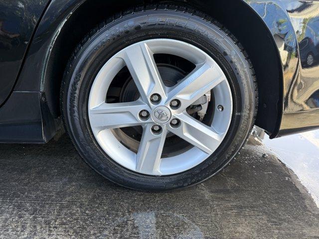 2014 Black Toyota Camry (4T1BF1FK1EU) with an 4 2.5 L engine, Automatic transmission, located at 27610 S Dixie Hwy, Homestead, FL, 33032, (305) 749-2348, 25.510241, -80.438301 - KBB.com 10 Best Hybrid Cars Under $30,000. Only 101,356 Miles! Delivers 35 Highway MPG and 25 City MPG! This Toyota Camry delivers a Regular Unleaded I-4 2.5 L/152 engine powering this Automatic transmission. Window Grid Antenna, Valet Function, Trunk Rear Cargo Access.*This Toyota Camry Comes Equip - Photo#15