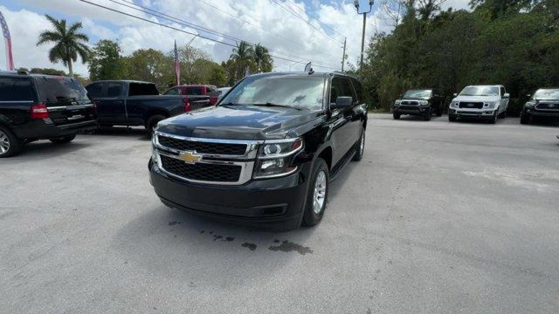 2019 Black /Jet Black Chevrolet Suburban (1GNSCHKC4KR) with an 8 5.3L engine, Automatic transmission, located at 27610 S Dixie Hwy, Homestead, FL, 33032, (305) 749-2348, 25.510241, -80.438301 - Boasts 22 Highway MPG and 15 City MPG! This Chevrolet Suburban boasts a Gas/Ethanol V8 5.3L/ engine powering this Automatic transmission. WHEELS, 18 X 8.5 (45.7 CM X 21.6 CM) ALUMINUM WITH HIGH-POLISHED FINISH (STD), TRANSMISSION, 6-SPEED AUTOMATIC, ELECTRONICALLY CONTROLLED with overdrive and tow/h - Photo#0