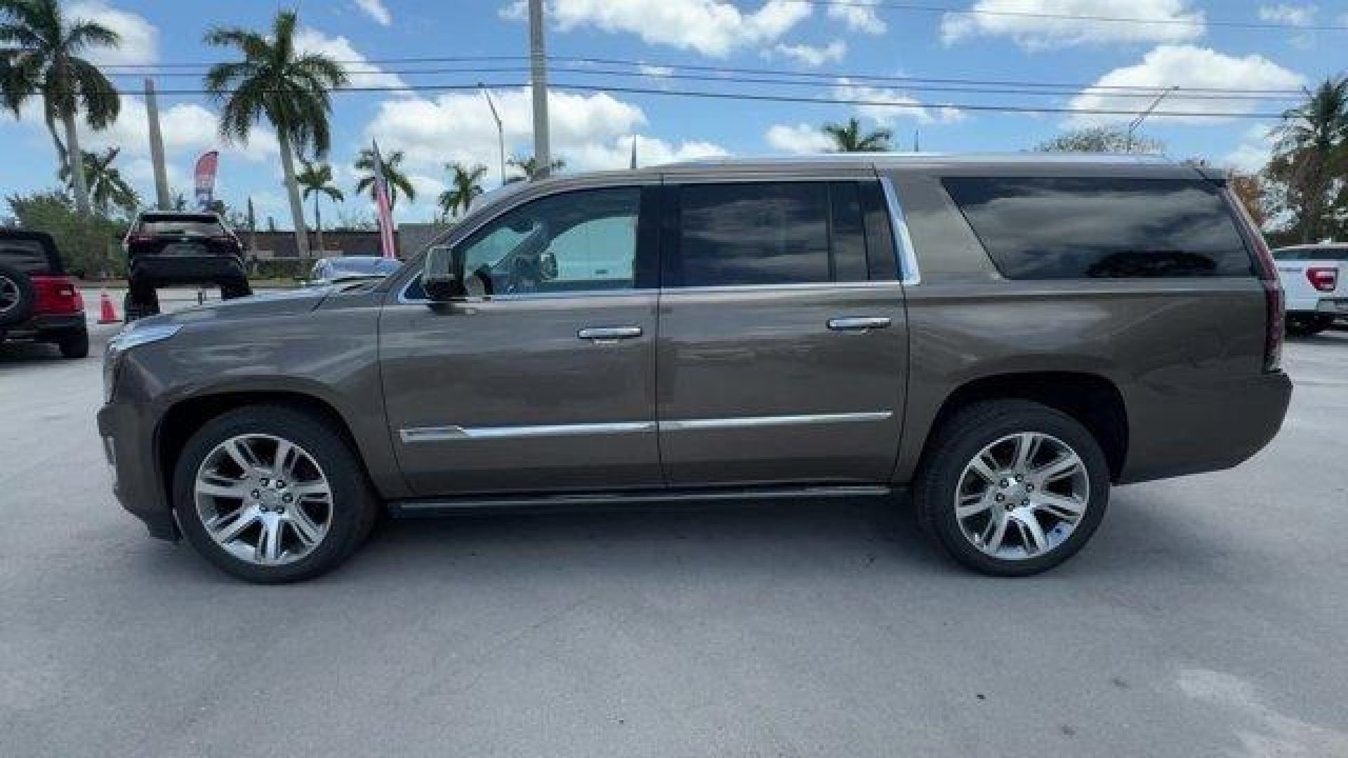 2016 Terra Mocha Metallic /Shale with Cocoa Accents Cadillac Escalade ESV (1GYS3JKJ2GR) with an 8 6.2L engine, Automatic transmission, located at 27610 S Dixie Hwy, Homestead, FL, 33032, (305) 749-2348, 25.510241, -80.438301 - Delivers 22 Highway MPG and 15 City MPG! This Cadillac Escalade ESV boasts a Gas V8 6.2L/376 engine powering this Automatic transmission. WHEELS, 22 X 9 (55.9 CM X 22.9 CM) DUAL 7-SPOKE ULTRA-BRIGHT FINISH ALUMINUM WITH PREMIUM PAINT, TRANSMISSION, 8-SPEED AUTOMATIC, 8L90 (STD), TERRA MOCHA METALLIC - Photo#1