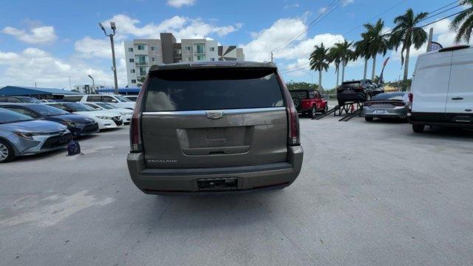 2016 Terra Mocha Metallic /Shale with Cocoa Accents Cadillac Escalade ESV (1GYS3JKJ2GR) with an 8 6.2L engine, Automatic transmission, located at 27610 S Dixie Hwy, Homestead, FL, 33032, (305) 749-2348, 25.510241, -80.438301 - Delivers 22 Highway MPG and 15 City MPG! This Cadillac Escalade ESV boasts a Gas V8 6.2L/376 engine powering this Automatic transmission. WHEELS, 22 X 9 (55.9 CM X 22.9 CM) DUAL 7-SPOKE ULTRA-BRIGHT FINISH ALUMINUM WITH PREMIUM PAINT, TRANSMISSION, 8-SPEED AUTOMATIC, 8L90 (STD), TERRA MOCHA METALLIC - Photo#3