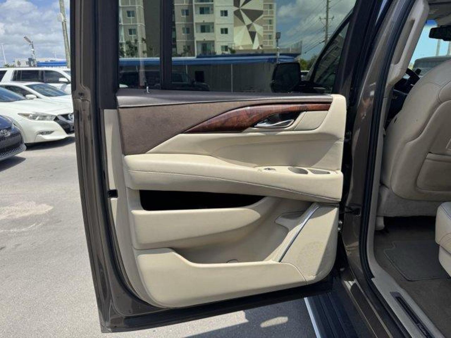 2016 Terra Mocha Metallic /Shale with Cocoa Accents Cadillac Escalade ESV (1GYS3JKJ2GR) with an 8 6.2L engine, Automatic transmission, located at 27610 S Dixie Hwy, Homestead, FL, 33032, (305) 749-2348, 25.510241, -80.438301 - Delivers 22 Highway MPG and 15 City MPG! This Cadillac Escalade ESV boasts a Gas V8 6.2L/376 engine powering this Automatic transmission. WHEELS, 22 X 9 (55.9 CM X 22.9 CM) DUAL 7-SPOKE ULTRA-BRIGHT FINISH ALUMINUM WITH PREMIUM PAINT, TRANSMISSION, 8-SPEED AUTOMATIC, 8L90 (STD), TERRA MOCHA METALLIC - Photo#16