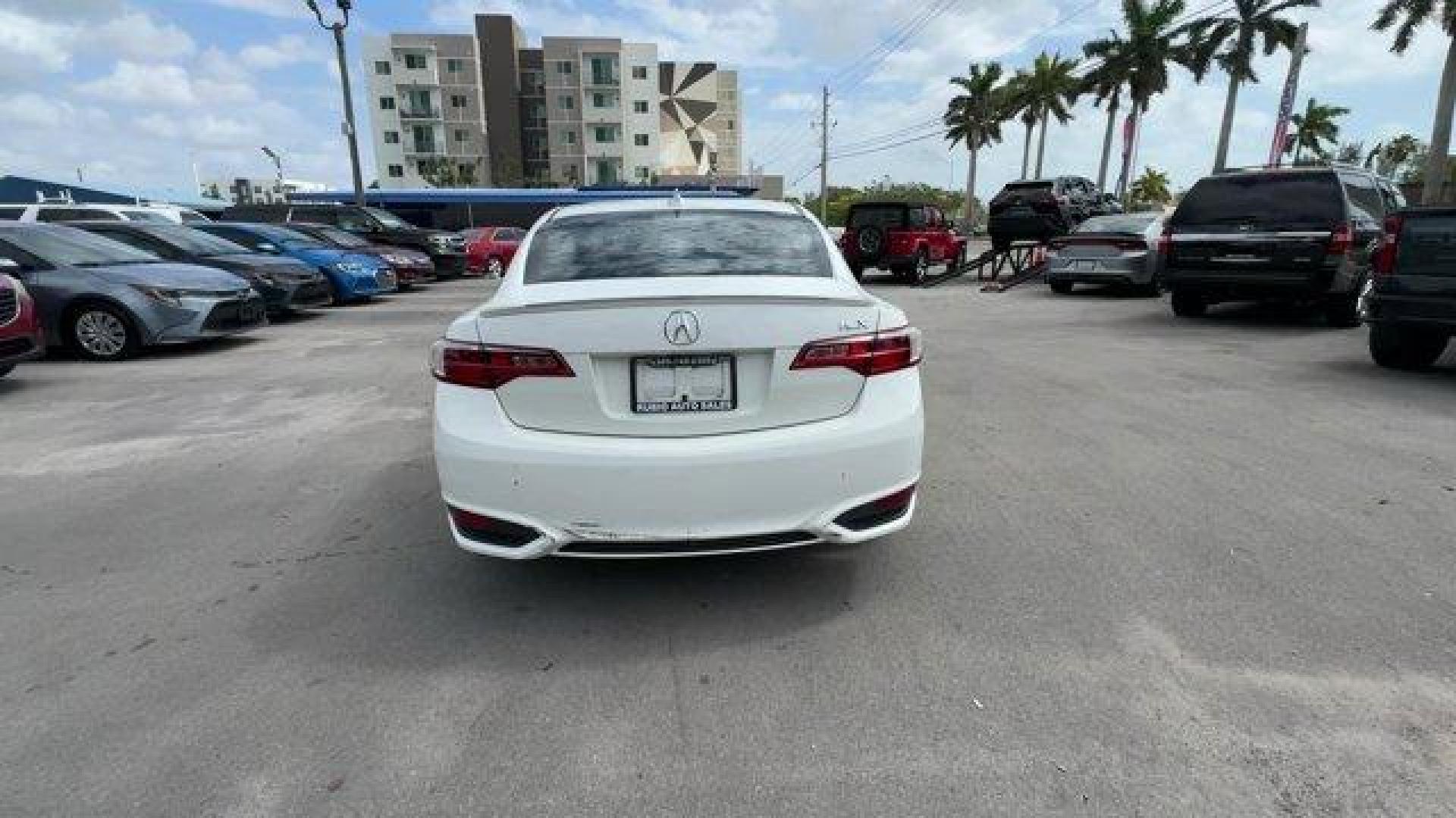 2016 White Acura ILX (19UDE2F83GA) with an 4 2.4 L engine, Automatic transmission, located at 27610 S Dixie Hwy, Homestead, FL, 33032, (305) 749-2348, 25.510241, -80.438301 - KBB.com Best Buy Awards Finalist. Boasts 36 Highway MPG and 25 City MPG! This Acura ILX boasts a Premium Unleaded I-4 2.4 L/144 engine powering this Automatic transmission. Window Grid Diversity Antenna, Wheels: 18 x 7.5 Aluminum Alloy Noise-Reducing, Valet Function.* This Acura ILX Features the Fol - Photo#3