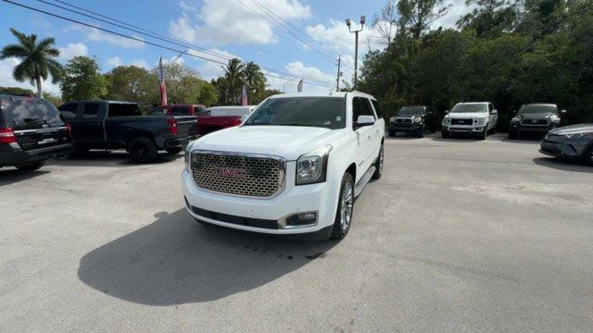 2015 Summit White /Jet Black GMC Yukon XL (1GKS1GKC3FR) with an 8 5.3L engine, Automatic transmission, located at 27610 S Dixie Hwy, Homestead, FL, 33032, (305) 749-2348, 25.510241, -80.438301 - KBB.com Brand Image Awards. Only 96,183 Miles! Delivers 23 Highway MPG and 16 City MPG! This GMC Yukon XL delivers a Gas/Ethanol V8 5.3L/323 engine powering this Automatic transmission. WHEELS, 18 X 8.5 (45.7 CM X 21.6 CM) BRIGHT MACHINED ALUMINUM (STD), UNIVERSAL HOME REMOTE includes garage door op - Photo#0