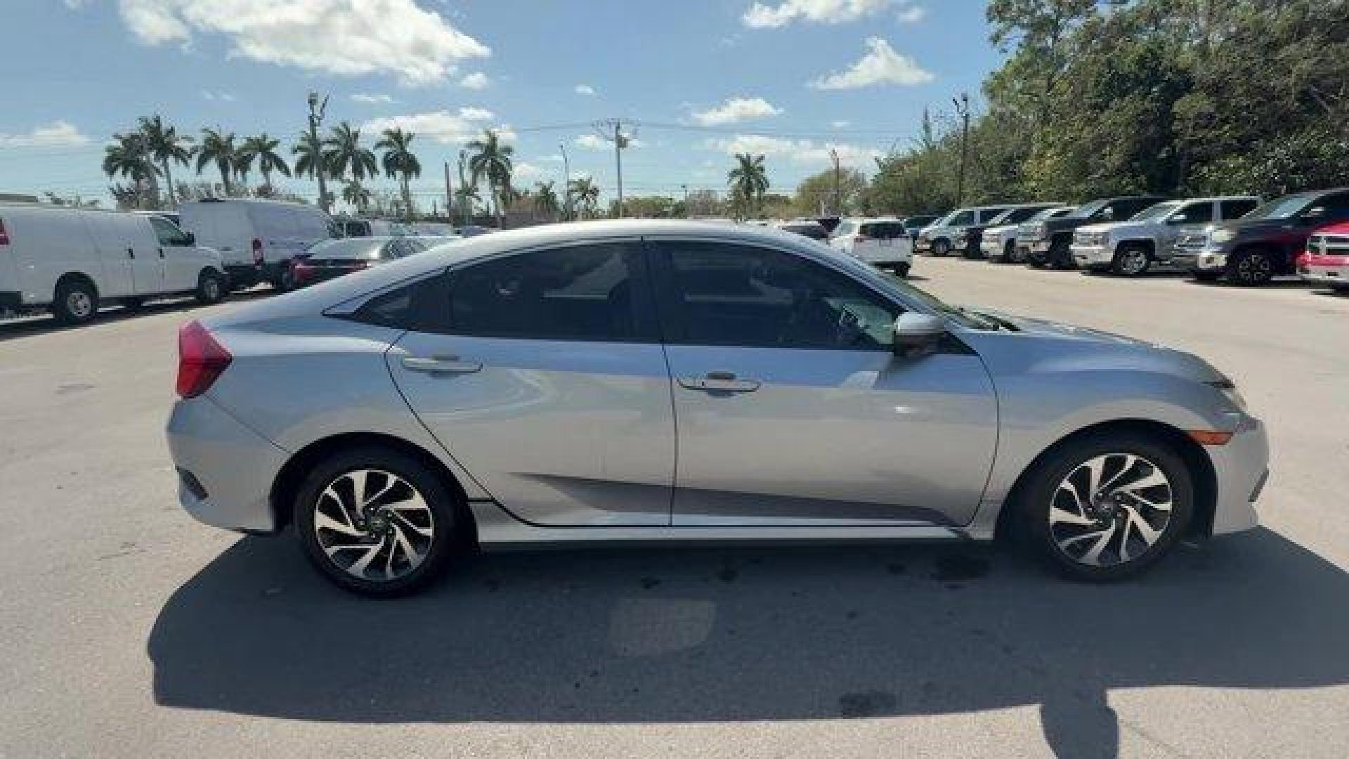 2018 Silver Honda Civic Sedan (19XFC2F78JE) with an 4 2.0 L engine, Variable transmission, located at 27610 S Dixie Hwy, Homestead, FL, 33032, (305) 749-2348, 25.510241, -80.438301 - KBB.com 10 Most Awarded Brands. Scores 40 Highway MPG and 31 City MPG! This Honda Civic Sedan delivers a Regular Unleaded I-4 2.0 L/122 engine powering this Variable transmission. Wheels: 16 Alloy, Wheels w/Silver Accents, VSA Electronic Stability Control (ESC).* This Honda Civic Sedan Features the - Photo#5