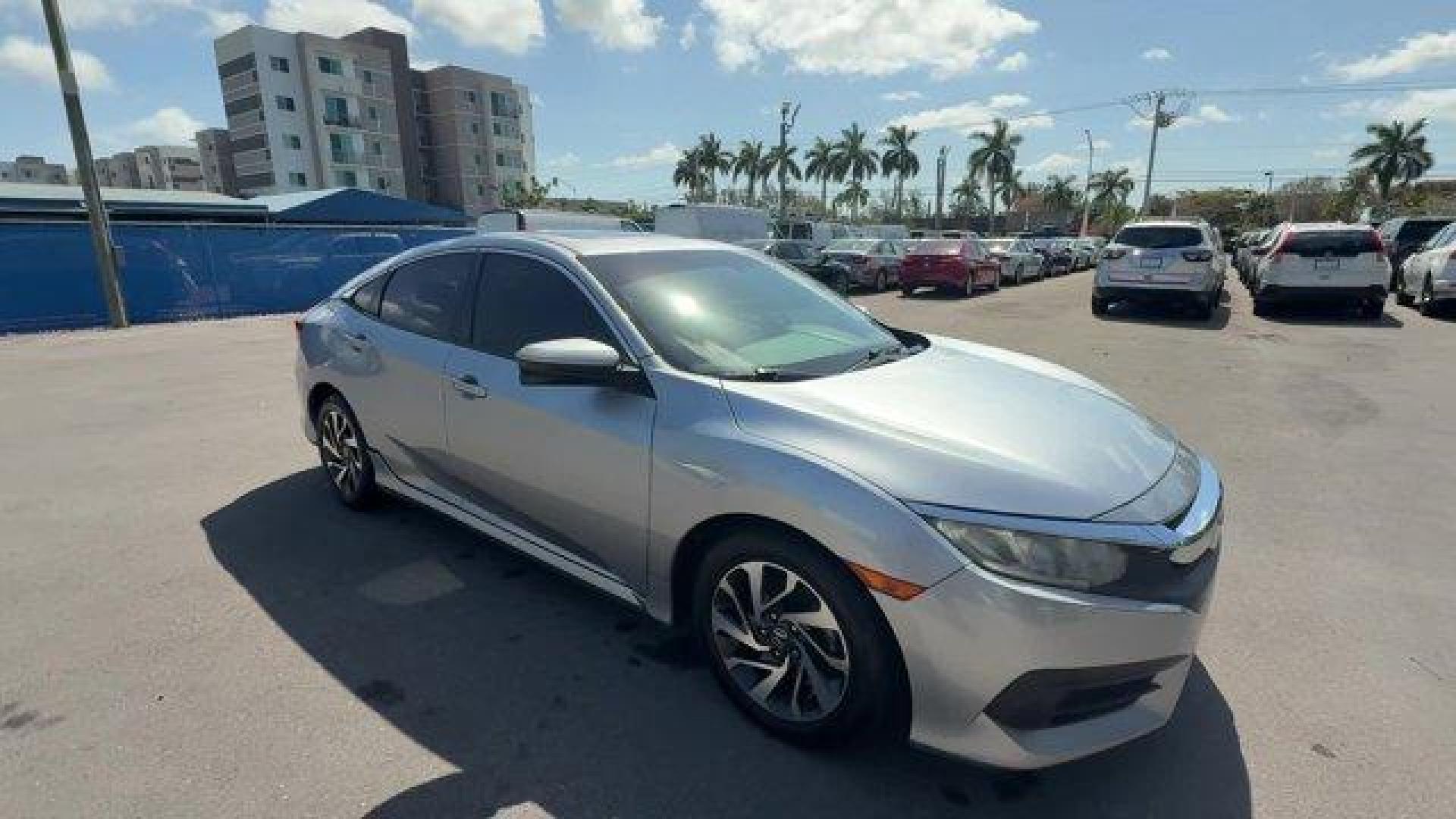 2018 Silver Honda Civic Sedan (19XFC2F78JE) with an 4 2.0 L engine, Variable transmission, located at 27610 S Dixie Hwy, Homestead, FL, 33032, (305) 749-2348, 25.510241, -80.438301 - KBB.com 10 Most Awarded Brands. Scores 40 Highway MPG and 31 City MPG! This Honda Civic Sedan delivers a Regular Unleaded I-4 2.0 L/122 engine powering this Variable transmission. Wheels: 16 Alloy, Wheels w/Silver Accents, VSA Electronic Stability Control (ESC).* This Honda Civic Sedan Features the - Photo#6