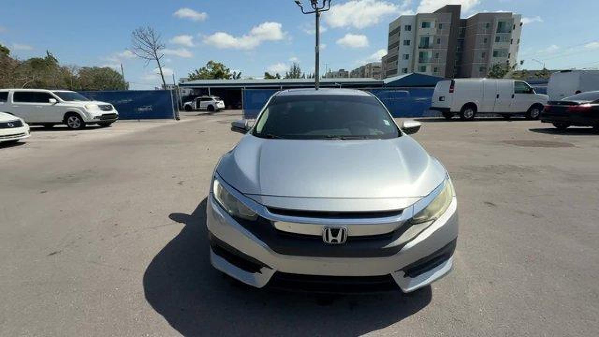 2018 Silver Honda Civic Sedan (19XFC2F78JE) with an 4 2.0 L engine, Variable transmission, located at 27610 S Dixie Hwy, Homestead, FL, 33032, (305) 749-2348, 25.510241, -80.438301 - KBB.com 10 Most Awarded Brands. Scores 40 Highway MPG and 31 City MPG! This Honda Civic Sedan delivers a Regular Unleaded I-4 2.0 L/122 engine powering this Variable transmission. Wheels: 16 Alloy, Wheels w/Silver Accents, VSA Electronic Stability Control (ESC).* This Honda Civic Sedan Features the - Photo#7