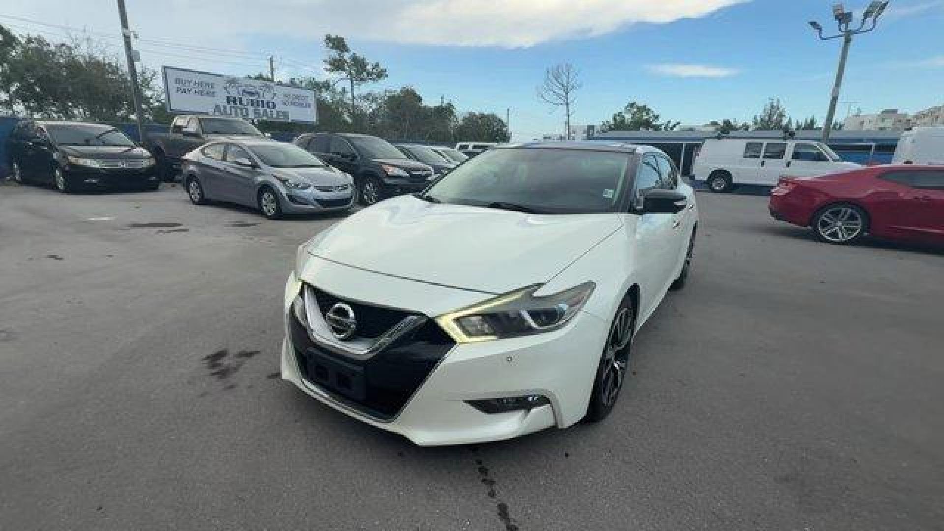 2017 Pearl White /Charcoal Nissan Maxima (1N4AA6APXHC) with an 6 3.5 L engine, Variable transmission, located at 27610 S Dixie Hwy, Homestead, FL, 33032, (305) 749-2348, 25.510241, -80.438301 - IIHS Top Safety Pick+. Boasts 30 Highway MPG and 21 City MPG! This Nissan Maxima boasts a Premium Unleaded V-6 3.5 L/213 engine powering this Variable transmission. PEARL WHITE, CHARCOAL, LEATHER-APPOINTED SEAT TRIM, [Z66] ACTIVATION DISCLAIMER.* This Nissan Maxima Features the Following Options *[N - Photo#0