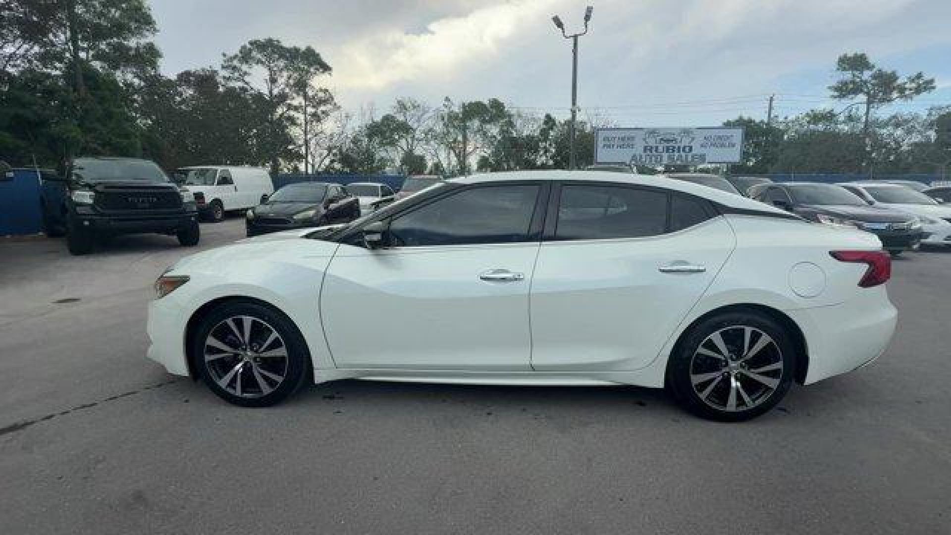 2017 Pearl White /Charcoal Nissan Maxima (1N4AA6APXHC) with an 6 3.5 L engine, Variable transmission, located at 27610 S Dixie Hwy, Homestead, FL, 33032, (305) 749-2348, 25.510241, -80.438301 - IIHS Top Safety Pick+. Boasts 30 Highway MPG and 21 City MPG! This Nissan Maxima boasts a Premium Unleaded V-6 3.5 L/213 engine powering this Variable transmission. PEARL WHITE, CHARCOAL, LEATHER-APPOINTED SEAT TRIM, [Z66] ACTIVATION DISCLAIMER.* This Nissan Maxima Features the Following Options *[N - Photo#1