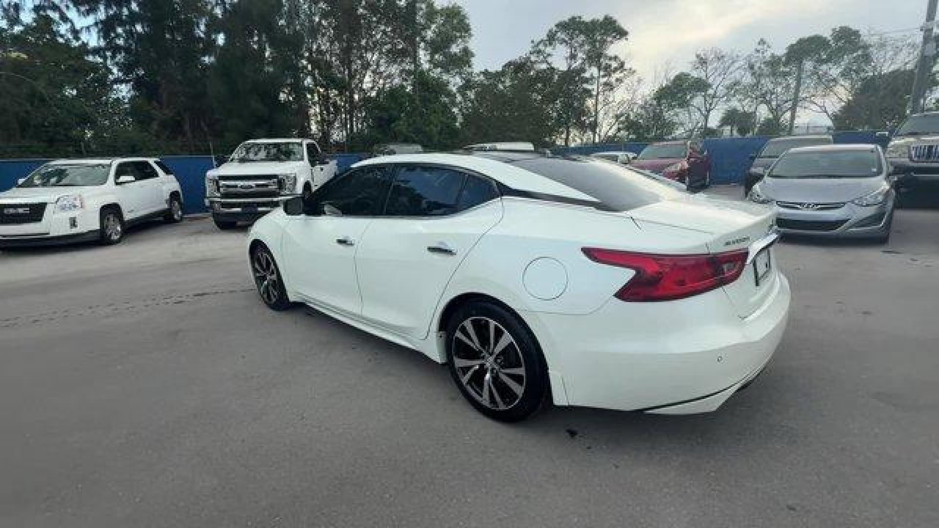 2017 Pearl White /Charcoal Nissan Maxima (1N4AA6APXHC) with an 6 3.5 L engine, Variable transmission, located at 27610 S Dixie Hwy, Homestead, FL, 33032, (305) 749-2348, 25.510241, -80.438301 - IIHS Top Safety Pick+. Boasts 30 Highway MPG and 21 City MPG! This Nissan Maxima boasts a Premium Unleaded V-6 3.5 L/213 engine powering this Variable transmission. PEARL WHITE, CHARCOAL, LEATHER-APPOINTED SEAT TRIM, [Z66] ACTIVATION DISCLAIMER.* This Nissan Maxima Features the Following Options *[N - Photo#2
