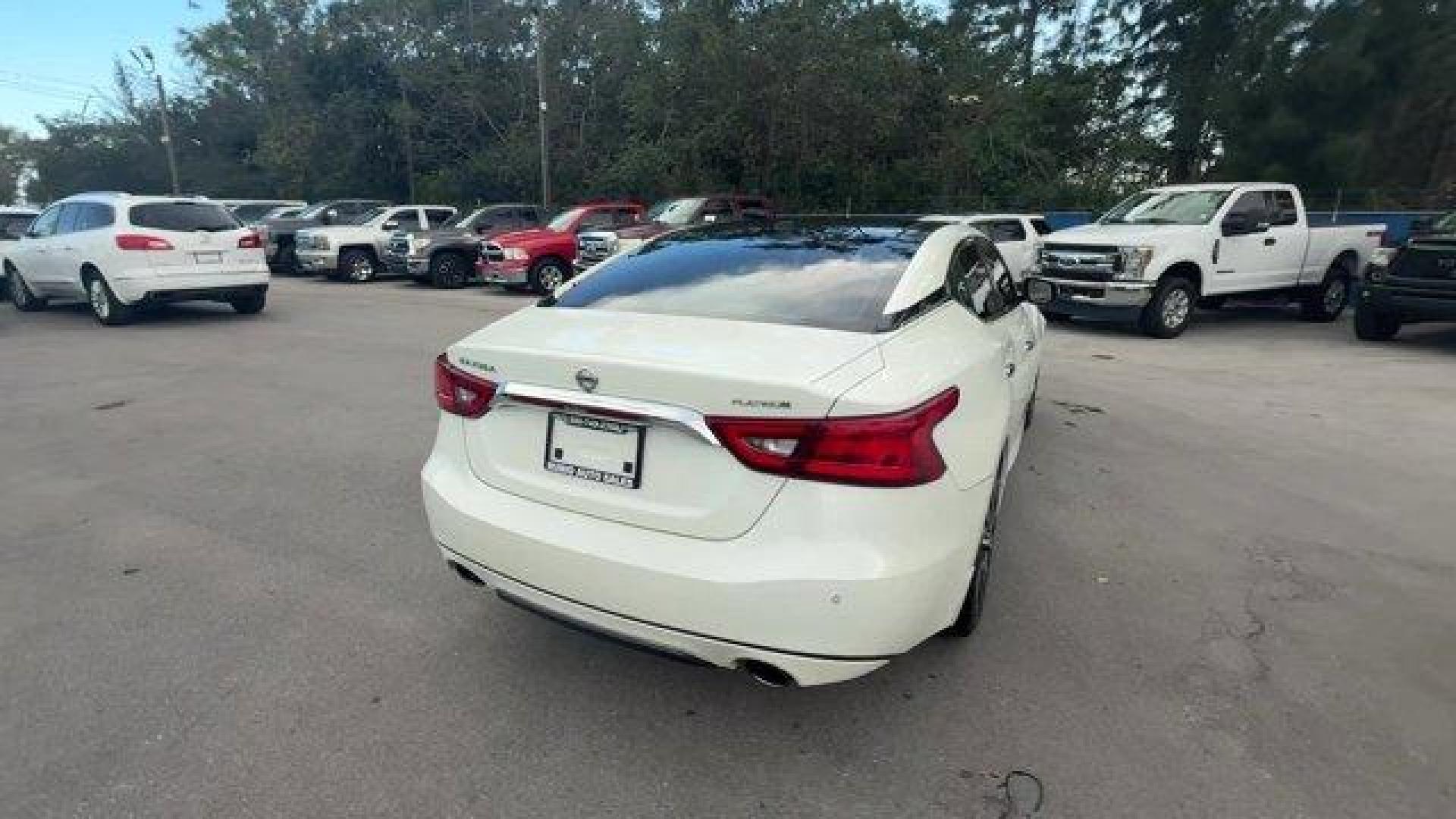 2017 Pearl White /Charcoal Nissan Maxima (1N4AA6APXHC) with an 6 3.5 L engine, Variable transmission, located at 27610 S Dixie Hwy, Homestead, FL, 33032, (305) 749-2348, 25.510241, -80.438301 - IIHS Top Safety Pick+. Boasts 30 Highway MPG and 21 City MPG! This Nissan Maxima boasts a Premium Unleaded V-6 3.5 L/213 engine powering this Variable transmission. PEARL WHITE, CHARCOAL, LEATHER-APPOINTED SEAT TRIM, [Z66] ACTIVATION DISCLAIMER.* This Nissan Maxima Features the Following Options *[N - Photo#4