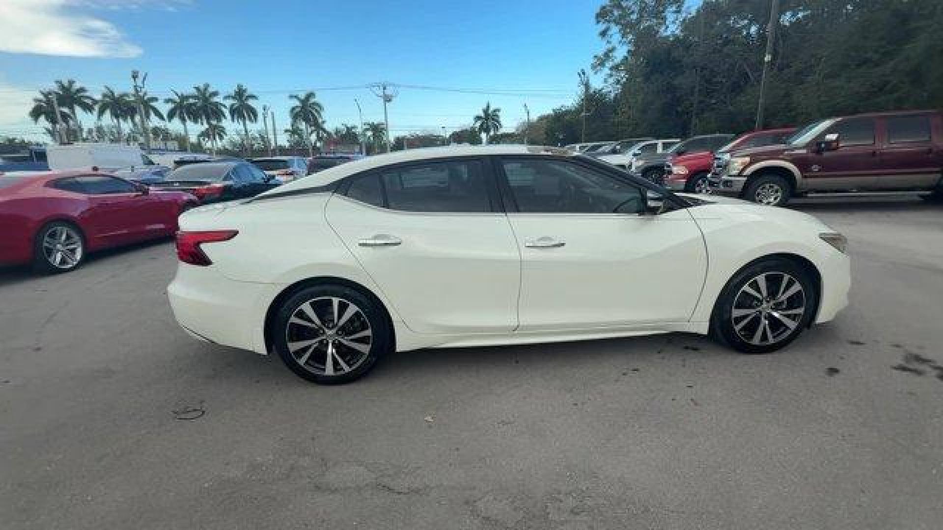 2017 Pearl White /Charcoal Nissan Maxima (1N4AA6APXHC) with an 6 3.5 L engine, Variable transmission, located at 27610 S Dixie Hwy, Homestead, FL, 33032, (305) 749-2348, 25.510241, -80.438301 - IIHS Top Safety Pick+. Boasts 30 Highway MPG and 21 City MPG! This Nissan Maxima boasts a Premium Unleaded V-6 3.5 L/213 engine powering this Variable transmission. PEARL WHITE, CHARCOAL, LEATHER-APPOINTED SEAT TRIM, [Z66] ACTIVATION DISCLAIMER.* This Nissan Maxima Features the Following Options *[N - Photo#5