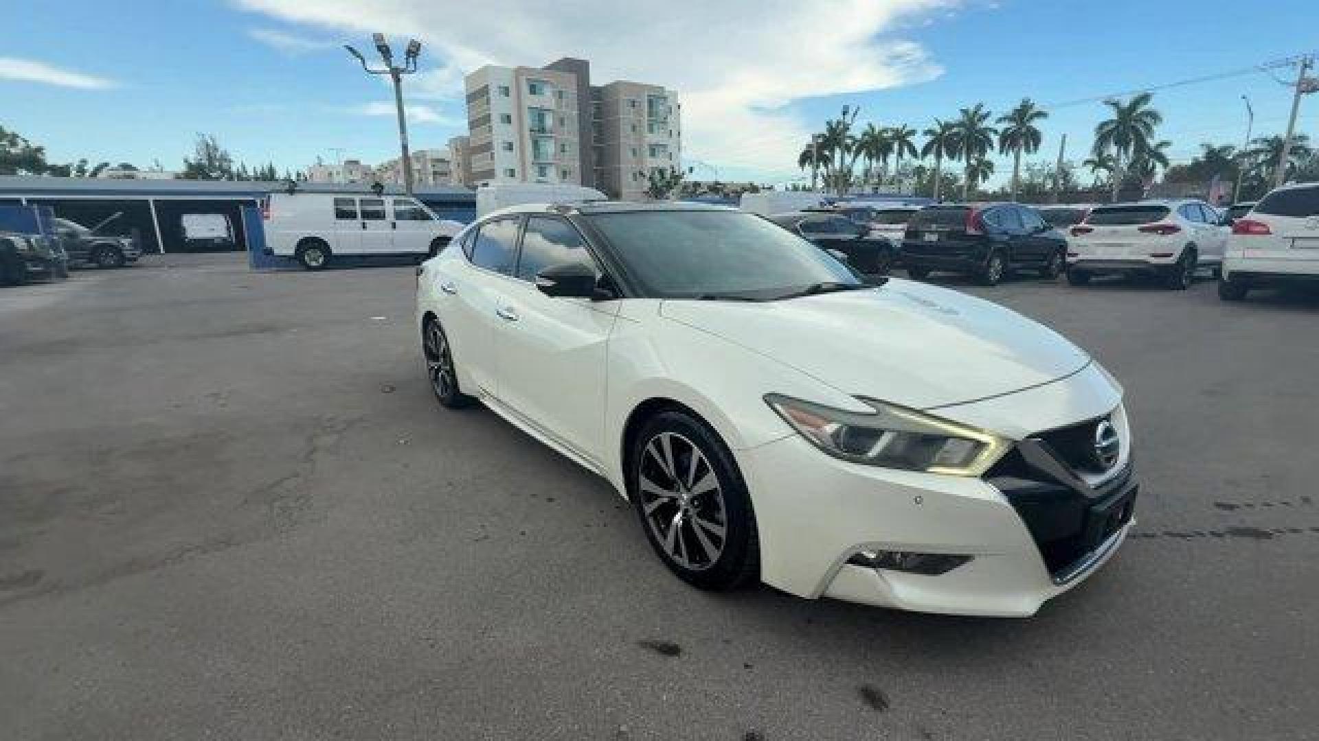 2017 Pearl White /Charcoal Nissan Maxima (1N4AA6APXHC) with an 6 3.5 L engine, Variable transmission, located at 27610 S Dixie Hwy, Homestead, FL, 33032, (305) 749-2348, 25.510241, -80.438301 - IIHS Top Safety Pick+. Boasts 30 Highway MPG and 21 City MPG! This Nissan Maxima boasts a Premium Unleaded V-6 3.5 L/213 engine powering this Variable transmission. PEARL WHITE, CHARCOAL, LEATHER-APPOINTED SEAT TRIM, [Z66] ACTIVATION DISCLAIMER.* This Nissan Maxima Features the Following Options *[N - Photo#6