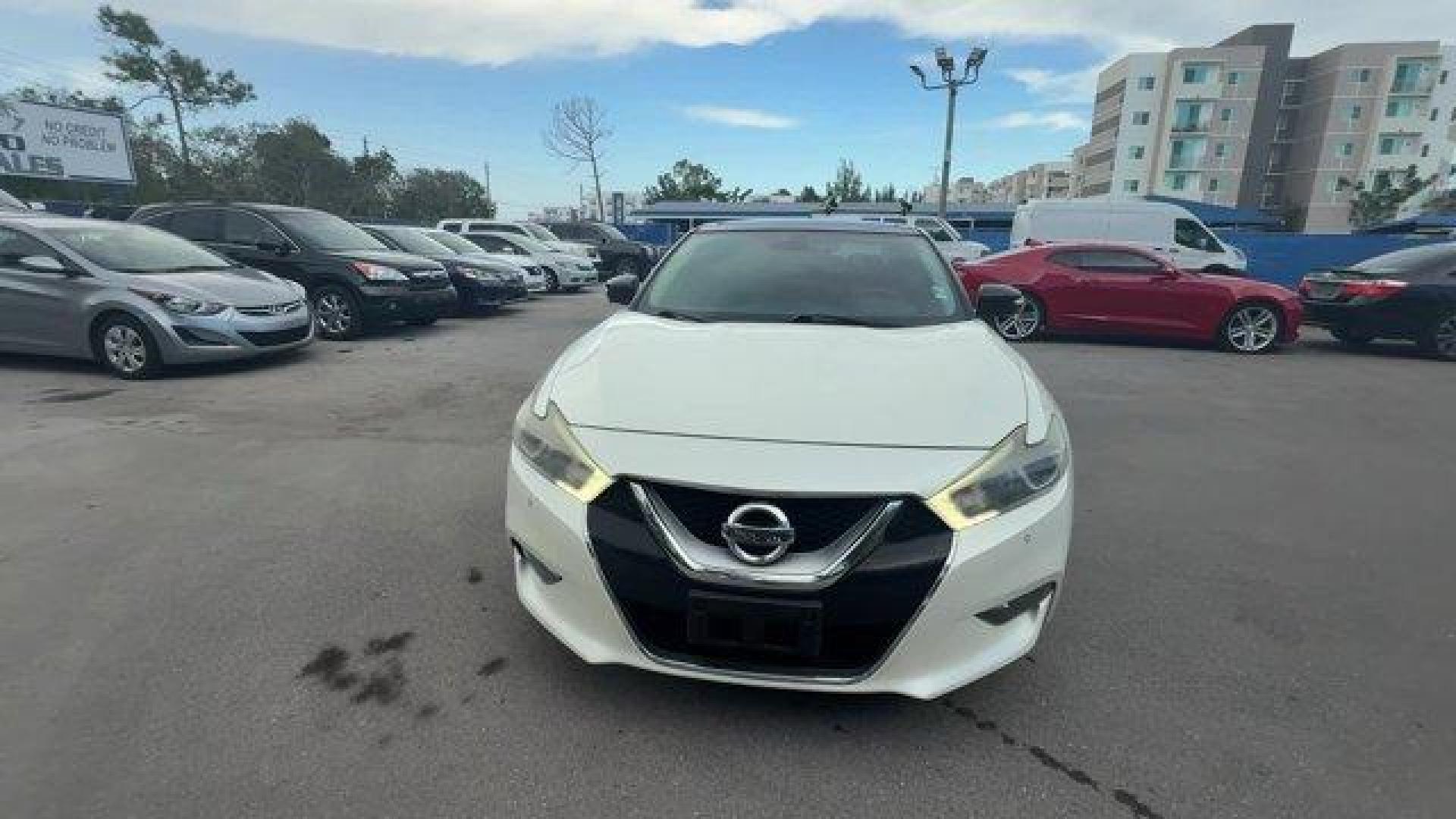 2017 Pearl White /Charcoal Nissan Maxima (1N4AA6APXHC) with an 6 3.5 L engine, Variable transmission, located at 27610 S Dixie Hwy, Homestead, FL, 33032, (305) 749-2348, 25.510241, -80.438301 - IIHS Top Safety Pick+. Boasts 30 Highway MPG and 21 City MPG! This Nissan Maxima boasts a Premium Unleaded V-6 3.5 L/213 engine powering this Variable transmission. PEARL WHITE, CHARCOAL, LEATHER-APPOINTED SEAT TRIM, [Z66] ACTIVATION DISCLAIMER.* This Nissan Maxima Features the Following Options *[N - Photo#7