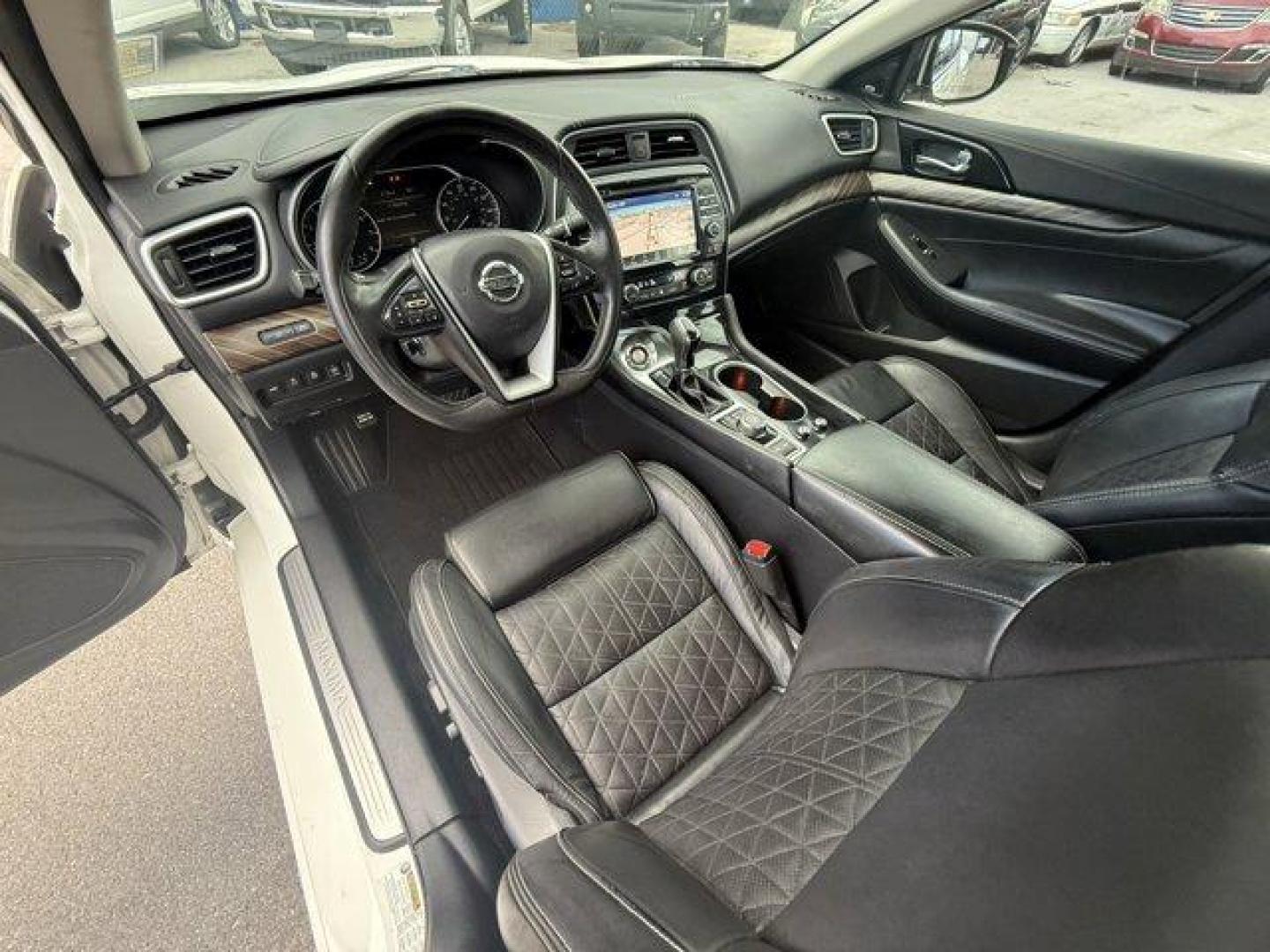 2017 Pearl White /Charcoal Nissan Maxima (1N4AA6APXHC) with an 6 3.5 L engine, Variable transmission, located at 27610 S Dixie Hwy, Homestead, FL, 33032, (305) 749-2348, 25.510241, -80.438301 - IIHS Top Safety Pick+. Boasts 30 Highway MPG and 21 City MPG! This Nissan Maxima boasts a Premium Unleaded V-6 3.5 L/213 engine powering this Variable transmission. PEARL WHITE, CHARCOAL, LEATHER-APPOINTED SEAT TRIM, [Z66] ACTIVATION DISCLAIMER.* This Nissan Maxima Features the Following Options *[N - Photo#11