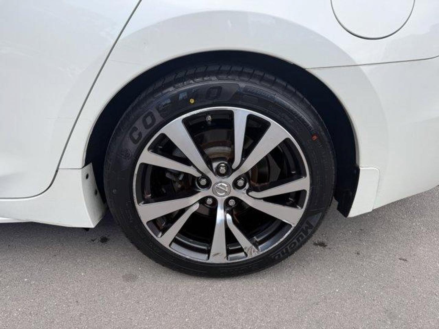 2017 Pearl White /Charcoal Nissan Maxima (1N4AA6APXHC) with an 6 3.5 L engine, Variable transmission, located at 27610 S Dixie Hwy, Homestead, FL, 33032, (305) 749-2348, 25.510241, -80.438301 - IIHS Top Safety Pick+. Boasts 30 Highway MPG and 21 City MPG! This Nissan Maxima boasts a Premium Unleaded V-6 3.5 L/213 engine powering this Variable transmission. PEARL WHITE, CHARCOAL, LEATHER-APPOINTED SEAT TRIM, [Z66] ACTIVATION DISCLAIMER.* This Nissan Maxima Features the Following Options *[N - Photo#16