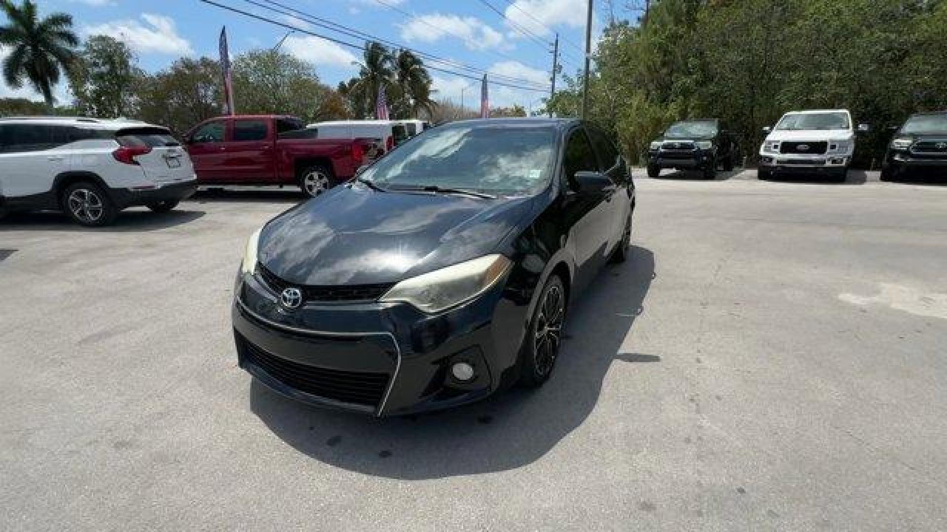 2016 Black Toyota Corolla (2T1BURHE8GC) with an 4 1.8 L engine, Automatic transmission, located at 27610 S Dixie Hwy, Homestead, FL, 33032, (305) 749-2348, 25.510241, -80.438301 - KBB.com 10 Best Used Compact Cars Under $15,000. This Toyota Corolla delivers a Regular Unleaded I-4 1.8 L/110 engine powering this Automatic transmission. Urethane Gear Shifter Material, Trunk Rear Cargo Access, Trip Computer.* This Toyota Corolla Features the Following Options *Torsion Beam Rear S - Photo#0