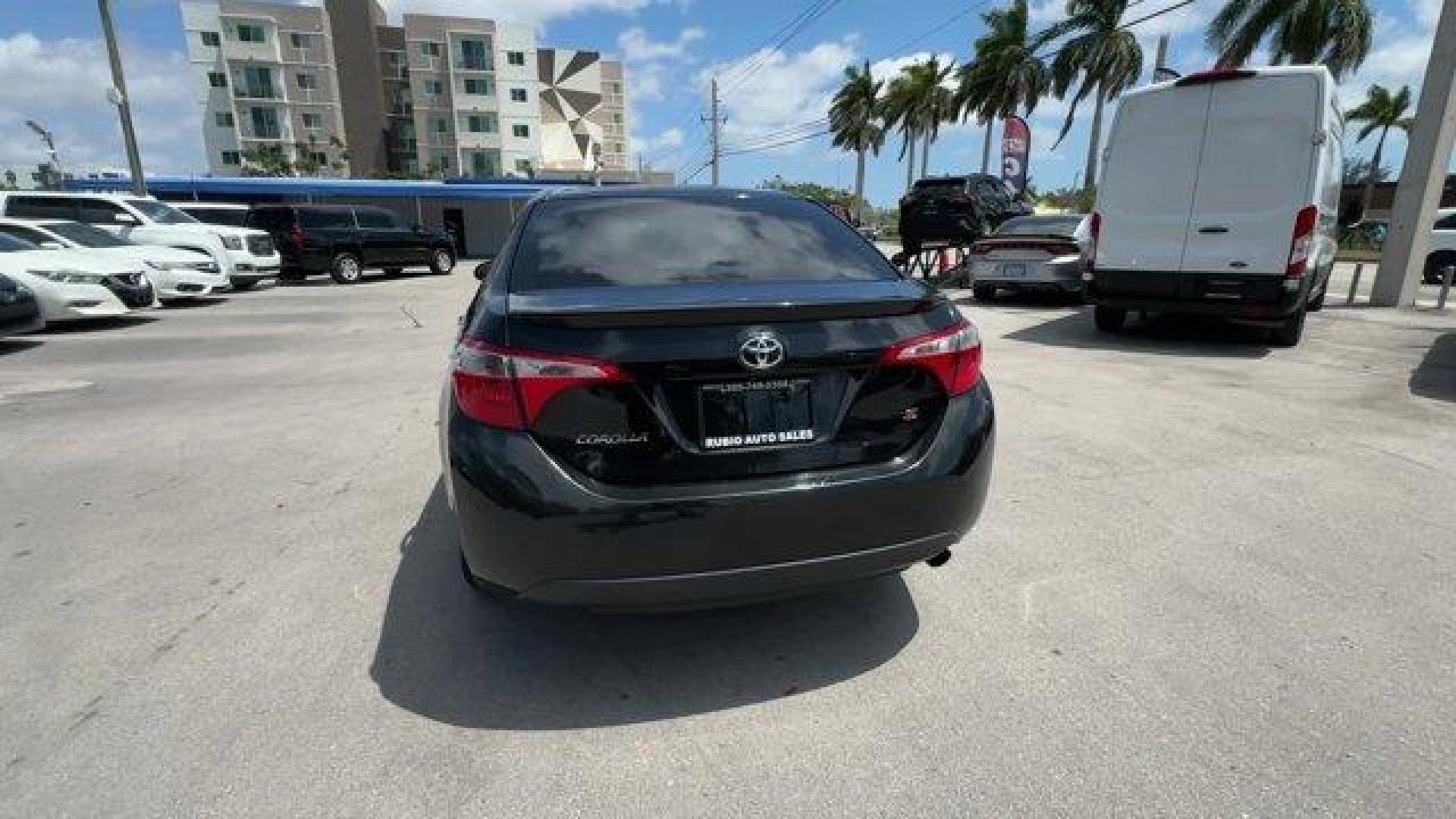 2016 Black Toyota Corolla (2T1BURHE8GC) with an 4 1.8 L engine, Automatic transmission, located at 27610 S Dixie Hwy, Homestead, FL, 33032, (305) 749-2348, 25.510241, -80.438301 - KBB.com 10 Best Used Compact Cars Under $15,000. This Toyota Corolla delivers a Regular Unleaded I-4 1.8 L/110 engine powering this Automatic transmission. Urethane Gear Shifter Material, Trunk Rear Cargo Access, Trip Computer.* This Toyota Corolla Features the Following Options *Torsion Beam Rear S - Photo#3