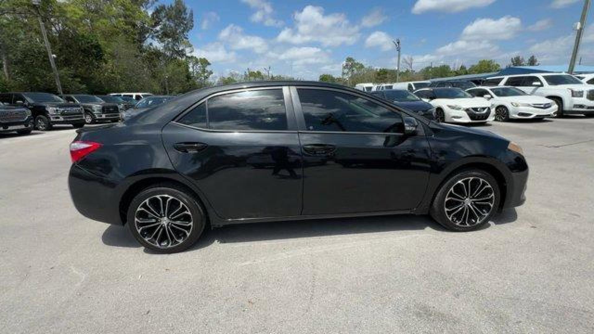 2016 Black Toyota Corolla (2T1BURHE8GC) with an 4 1.8 L engine, Automatic transmission, located at 27610 S Dixie Hwy, Homestead, FL, 33032, (305) 749-2348, 25.510241, -80.438301 - KBB.com 10 Best Used Compact Cars Under $15,000. This Toyota Corolla delivers a Regular Unleaded I-4 1.8 L/110 engine powering this Automatic transmission. Urethane Gear Shifter Material, Trunk Rear Cargo Access, Trip Computer.* This Toyota Corolla Features the Following Options *Torsion Beam Rear S - Photo#5
