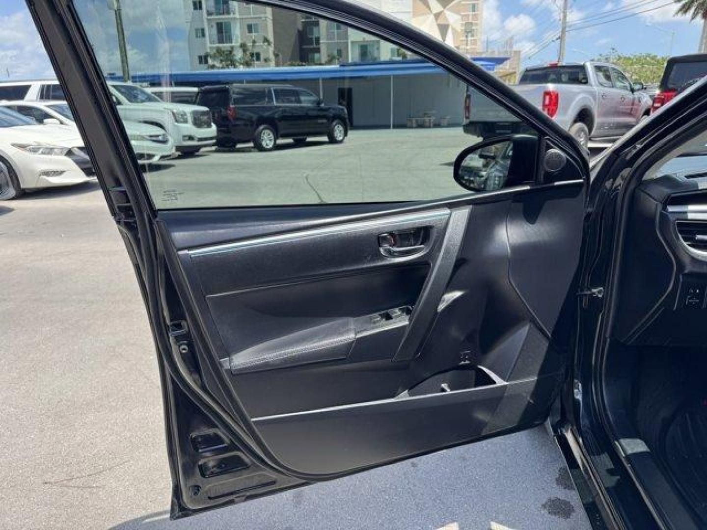 2016 Black Toyota Corolla (2T1BURHE8GC) with an 4 1.8 L engine, Automatic transmission, located at 27610 S Dixie Hwy, Homestead, FL, 33032, (305) 749-2348, 25.510241, -80.438301 - KBB.com 10 Best Used Compact Cars Under $15,000. This Toyota Corolla delivers a Regular Unleaded I-4 1.8 L/110 engine powering this Automatic transmission. Urethane Gear Shifter Material, Trunk Rear Cargo Access, Trip Computer.* This Toyota Corolla Features the Following Options *Torsion Beam Rear S - Photo#13