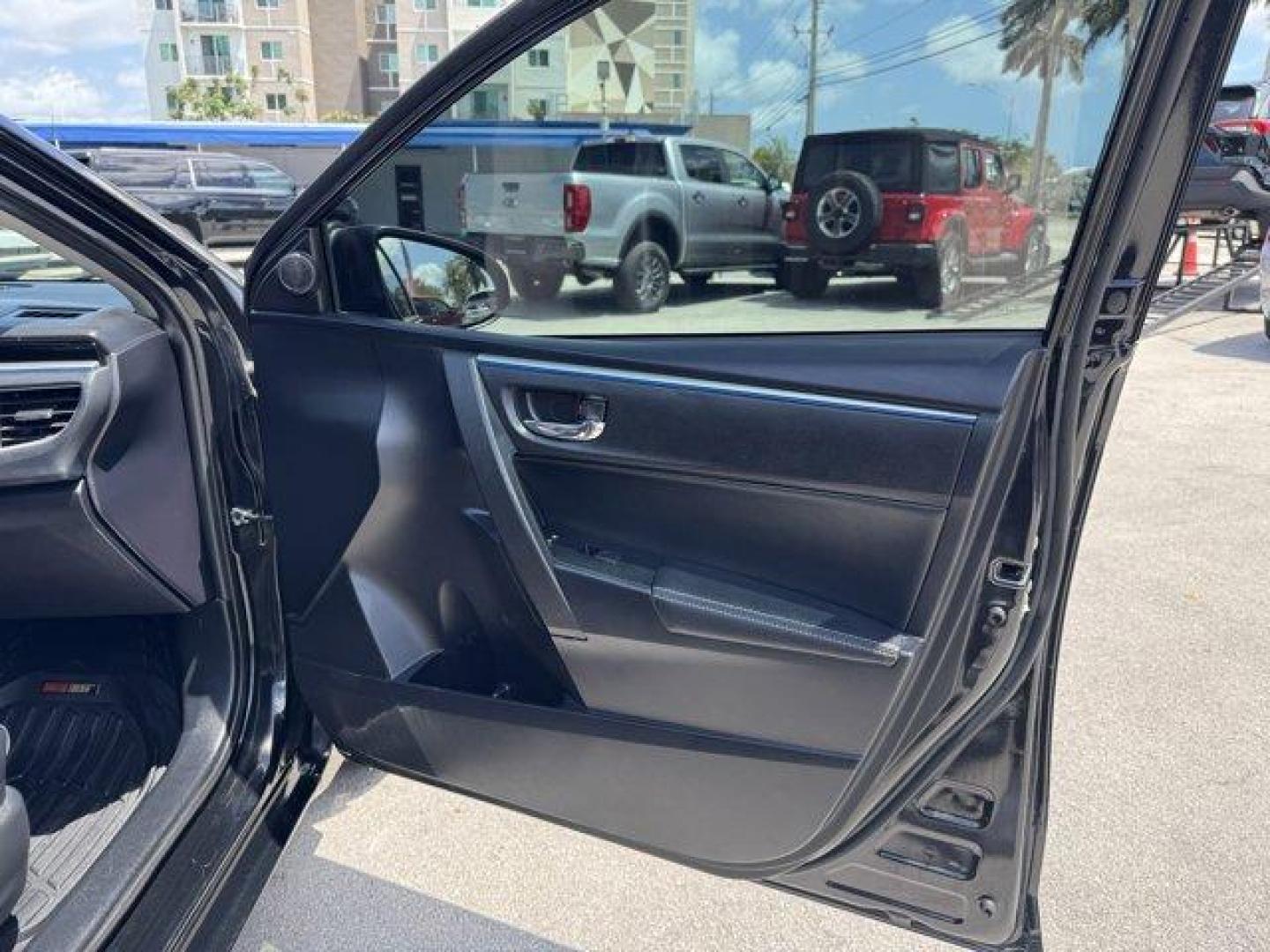 2016 Black Toyota Corolla (2T1BURHE8GC) with an 4 1.8 L engine, Automatic transmission, located at 27610 S Dixie Hwy, Homestead, FL, 33032, (305) 749-2348, 25.510241, -80.438301 - KBB.com 10 Best Used Compact Cars Under $15,000. This Toyota Corolla delivers a Regular Unleaded I-4 1.8 L/110 engine powering this Automatic transmission. Urethane Gear Shifter Material, Trunk Rear Cargo Access, Trip Computer.* This Toyota Corolla Features the Following Options *Torsion Beam Rear S - Photo#14