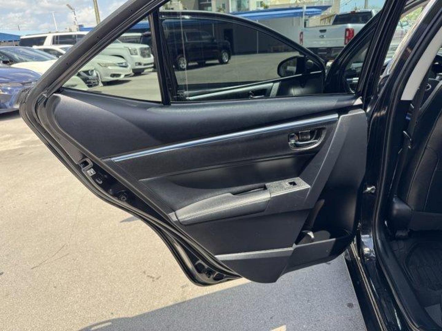 2016 Black Toyota Corolla (2T1BURHE8GC) with an 4 1.8 L engine, Automatic transmission, located at 27610 S Dixie Hwy, Homestead, FL, 33032, (305) 749-2348, 25.510241, -80.438301 - KBB.com 10 Best Used Compact Cars Under $15,000. This Toyota Corolla delivers a Regular Unleaded I-4 1.8 L/110 engine powering this Automatic transmission. Urethane Gear Shifter Material, Trunk Rear Cargo Access, Trip Computer.* This Toyota Corolla Features the Following Options *Torsion Beam Rear S - Photo#15