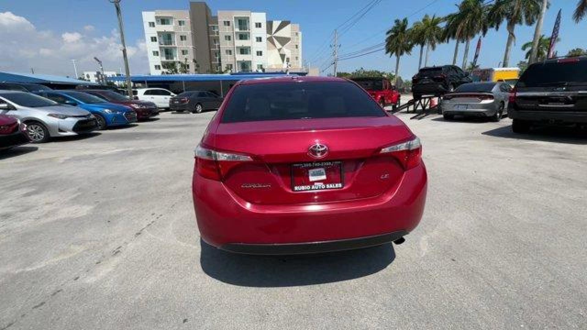 2014 Red Toyota Corolla (2T1BURHE6EC) with an 4 1.8 L engine, Automatic transmission, located at 27610 S Dixie Hwy, Homestead, FL, 33032, (305) 749-2348, 25.510241, -80.438301 - KBB.com 10 Tech-Savviest Cars Under $20,000. This Toyota Corolla boasts a Regular Unleaded I-4 1.8 L/110 engine powering this Automatic transmission. Window Grid Antenna, Urethane Gear Shifter Material, Trunk Rear Cargo Access.*This Toyota Corolla Comes Equipped with These Options *Trip Computer, To - Photo#3