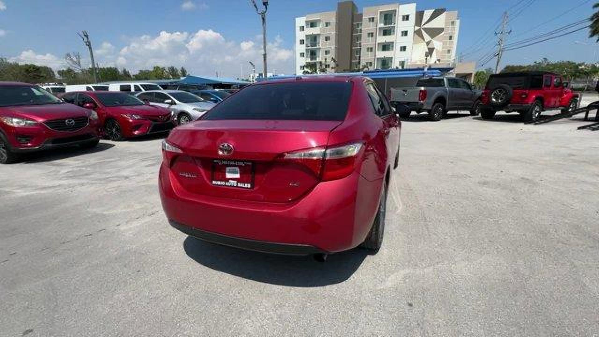 2014 Red Toyota Corolla (2T1BURHE6EC) with an 4 1.8 L engine, Automatic transmission, located at 27610 S Dixie Hwy, Homestead, FL, 33032, (305) 749-2348, 25.510241, -80.438301 - KBB.com 10 Tech-Savviest Cars Under $20,000. This Toyota Corolla boasts a Regular Unleaded I-4 1.8 L/110 engine powering this Automatic transmission. Window Grid Antenna, Urethane Gear Shifter Material, Trunk Rear Cargo Access.*This Toyota Corolla Comes Equipped with These Options *Trip Computer, To - Photo#4