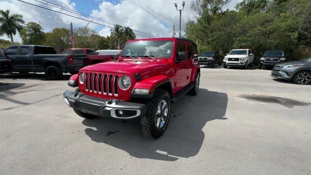 2020 Firecracker Red Clearcoat /Black Jeep Wrangler Unlimited (1C4HJXEG4LW) with an 6 3.6 L engine, Automatic transmission, located at 27610 S Dixie Hwy, Homestead, FL, 33032, (305) 749-2348, 25.510241, -80.438301 - Scores 22 Highway MPG and 19 City MPG! This Jeep Wrangler Unlimited boasts a Gas/Electric V-6 3.6 L/220 engine powering this Automatic transmission. WHEELS: 18 X 7.5 POLISHED W/GRAY SPOKES (STD), TRANSMISSION: 8-SPEED AUTOMATIC (850RE) -inc: TIP Start, Hill Descent Control, TIRES: 255/70R18 ALL SEAS - Photo#0