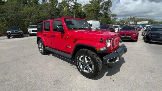 2020 Firecracker Red Clearcoat /Black Jeep Wrangler Unlimited (1C4HJXEG4LW) with an 6 3.6 L engine, Automatic transmission, located at 27610 S Dixie Hwy, Homestead, FL, 33032, (305) 749-2348, 25.510241, -80.438301 - Scores 22 Highway MPG and 19 City MPG! This Jeep Wrangler Unlimited boasts a Gas/Electric V-6 3.6 L/220 engine powering this Automatic transmission. WHEELS: 18 X 7.5 POLISHED W/GRAY SPOKES (STD), TRANSMISSION: 8-SPEED AUTOMATIC (850RE) -inc: TIP Start, Hill Descent Control, TIRES: 255/70R18 ALL SEAS - Photo#2