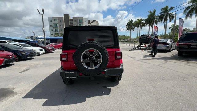 2020 Firecracker Red Clearcoat /Black Jeep Wrangler Unlimited (1C4HJXEG4LW) with an 6 3.6 L engine, Automatic transmission, located at 27610 S Dixie Hwy, Homestead, FL, 33032, (305) 749-2348, 25.510241, -80.438301 - Scores 22 Highway MPG and 19 City MPG! This Jeep Wrangler Unlimited boasts a Gas/Electric V-6 3.6 L/220 engine powering this Automatic transmission. WHEELS: 18 X 7.5 POLISHED W/GRAY SPOKES (STD), TRANSMISSION: 8-SPEED AUTOMATIC (850RE) -inc: TIP Start, Hill Descent Control, TIRES: 255/70R18 ALL SEAS - Photo#3
