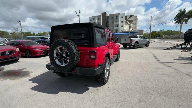 2020 Firecracker Red Clearcoat /Black Jeep Wrangler Unlimited (1C4HJXEG4LW) with an 6 3.6 L engine, Automatic transmission, located at 27610 S Dixie Hwy, Homestead, FL, 33032, (305) 749-2348, 25.510241, -80.438301 - Scores 22 Highway MPG and 19 City MPG! This Jeep Wrangler Unlimited boasts a Gas/Electric V-6 3.6 L/220 engine powering this Automatic transmission. WHEELS: 18 X 7.5 POLISHED W/GRAY SPOKES (STD), TRANSMISSION: 8-SPEED AUTOMATIC (850RE) -inc: TIP Start, Hill Descent Control, TIRES: 255/70R18 ALL SEAS - Photo#4