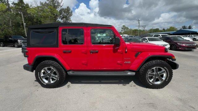 2020 Firecracker Red Clearcoat /Black Jeep Wrangler Unlimited (1C4HJXEG4LW) with an 6 3.6 L engine, Automatic transmission, located at 27610 S Dixie Hwy, Homestead, FL, 33032, (305) 749-2348, 25.510241, -80.438301 - Scores 22 Highway MPG and 19 City MPG! This Jeep Wrangler Unlimited boasts a Gas/Electric V-6 3.6 L/220 engine powering this Automatic transmission. WHEELS: 18 X 7.5 POLISHED W/GRAY SPOKES (STD), TRANSMISSION: 8-SPEED AUTOMATIC (850RE) -inc: TIP Start, Hill Descent Control, TIRES: 255/70R18 ALL SEAS - Photo#5
