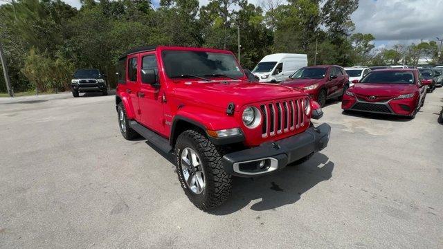 2020 Firecracker Red Clearcoat /Black Jeep Wrangler Unlimited (1C4HJXEG4LW) with an 6 3.6 L engine, Automatic transmission, located at 27610 S Dixie Hwy, Homestead, FL, 33032, (305) 749-2348, 25.510241, -80.438301 - Scores 22 Highway MPG and 19 City MPG! This Jeep Wrangler Unlimited boasts a Gas/Electric V-6 3.6 L/220 engine powering this Automatic transmission. WHEELS: 18 X 7.5 POLISHED W/GRAY SPOKES (STD), TRANSMISSION: 8-SPEED AUTOMATIC (850RE) -inc: TIP Start, Hill Descent Control, TIRES: 255/70R18 ALL SEAS - Photo#6