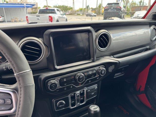 2020 Firecracker Red Clearcoat /Black Jeep Wrangler Unlimited (1C4HJXEG4LW) with an 6 3.6 L engine, Automatic transmission, located at 27610 S Dixie Hwy, Homestead, FL, 33032, (305) 749-2348, 25.510241, -80.438301 - Scores 22 Highway MPG and 19 City MPG! This Jeep Wrangler Unlimited boasts a Gas/Electric V-6 3.6 L/220 engine powering this Automatic transmission. WHEELS: 18 X 7.5 POLISHED W/GRAY SPOKES (STD), TRANSMISSION: 8-SPEED AUTOMATIC (850RE) -inc: TIP Start, Hill Descent Control, TIRES: 255/70R18 ALL SEAS - Photo#9