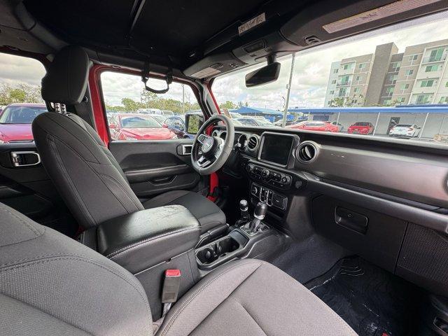 2020 Firecracker Red Clearcoat /Black Jeep Wrangler Unlimited (1C4HJXEG4LW) with an 6 3.6 L engine, Automatic transmission, located at 27610 S Dixie Hwy, Homestead, FL, 33032, (305) 749-2348, 25.510241, -80.438301 - Scores 22 Highway MPG and 19 City MPG! This Jeep Wrangler Unlimited boasts a Gas/Electric V-6 3.6 L/220 engine powering this Automatic transmission. WHEELS: 18 X 7.5 POLISHED W/GRAY SPOKES (STD), TRANSMISSION: 8-SPEED AUTOMATIC (850RE) -inc: TIP Start, Hill Descent Control, TIRES: 255/70R18 ALL SEAS - Photo#11