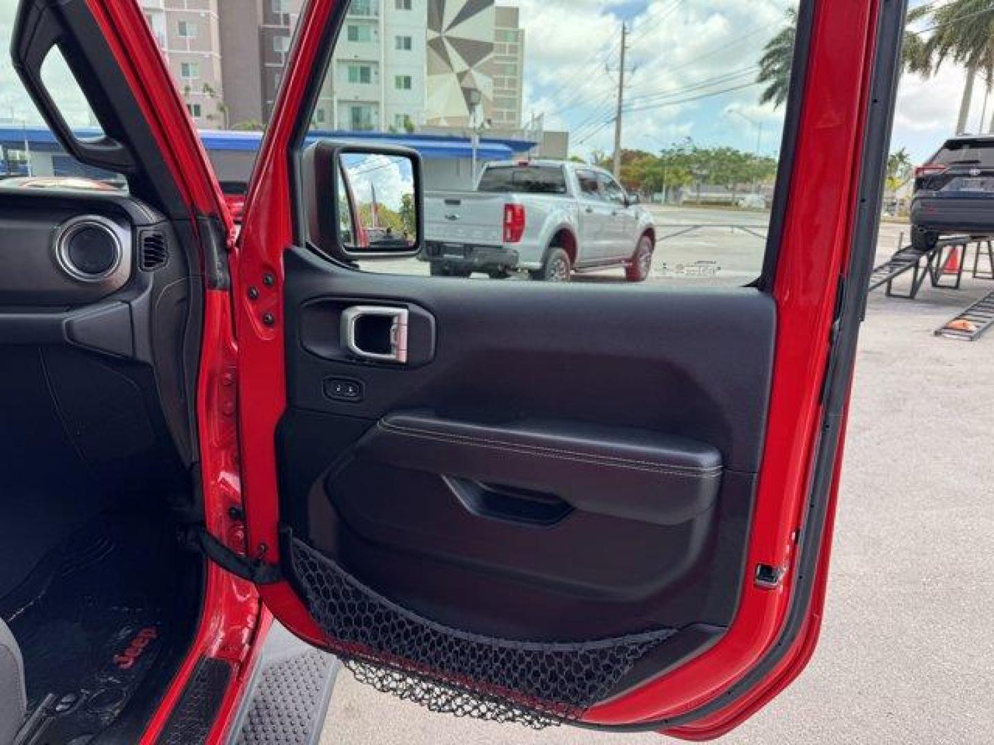 2020 Firecracker Red Clearcoat /Black Jeep Wrangler Unlimited (1C4HJXEG4LW) with an 6 3.6 L engine, Automatic transmission, located at 27610 S Dixie Hwy, Homestead, FL, 33032, (305) 749-2348, 25.510241, -80.438301 - Scores 22 Highway MPG and 19 City MPG! This Jeep Wrangler Unlimited boasts a Gas/Electric V-6 3.6 L/220 engine powering this Automatic transmission. WHEELS: 18 X 7.5 POLISHED W/GRAY SPOKES (STD), TRANSMISSION: 8-SPEED AUTOMATIC (850RE) -inc: TIP Start, Hill Descent Control, TIRES: 255/70R18 ALL SEAS - Photo#14