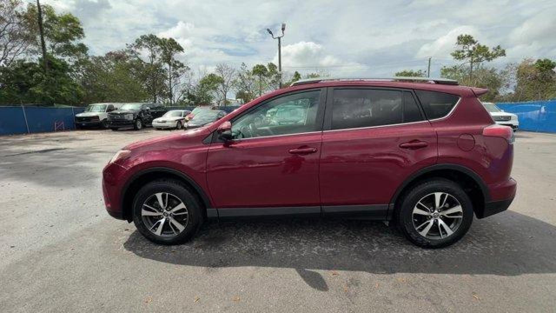 2018 Red Toyota RAV4 (2T3WFREV7JW) with an 4 2.5 L engine, Automatic transmission, located at 27610 S Dixie Hwy, Homestead, FL, 33032, (305) 749-2348, 25.510241, -80.438301 - KBB.com 10 Best SUVs Under $25,000. Delivers 30 Highway MPG and 23 City MPG! This Toyota RAV4 delivers a Regular Unleaded I-4 2.5 L/152 engine powering this Automatic transmission. Variable Intermittent Wipers, Trip Computer, Transmission: 6-Speed Automatic.*This Toyota RAV4 Comes Equipped with Thes - Photo#1