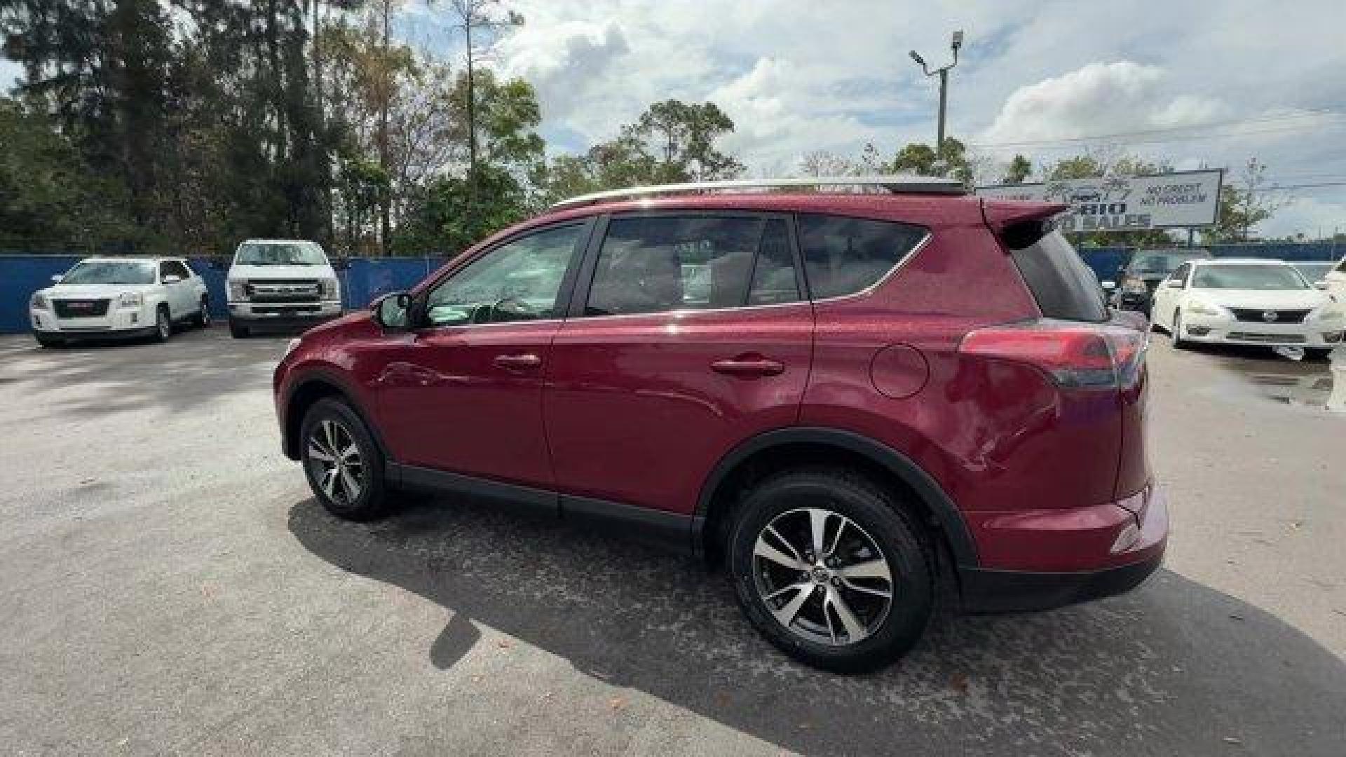 2018 Red Toyota RAV4 (2T3WFREV7JW) with an 4 2.5 L engine, Automatic transmission, located at 27610 S Dixie Hwy, Homestead, FL, 33032, (305) 749-2348, 25.510241, -80.438301 - KBB.com 10 Best SUVs Under $25,000. Delivers 30 Highway MPG and 23 City MPG! This Toyota RAV4 delivers a Regular Unleaded I-4 2.5 L/152 engine powering this Automatic transmission. Variable Intermittent Wipers, Trip Computer, Transmission: 6-Speed Automatic.*This Toyota RAV4 Comes Equipped with Thes - Photo#2