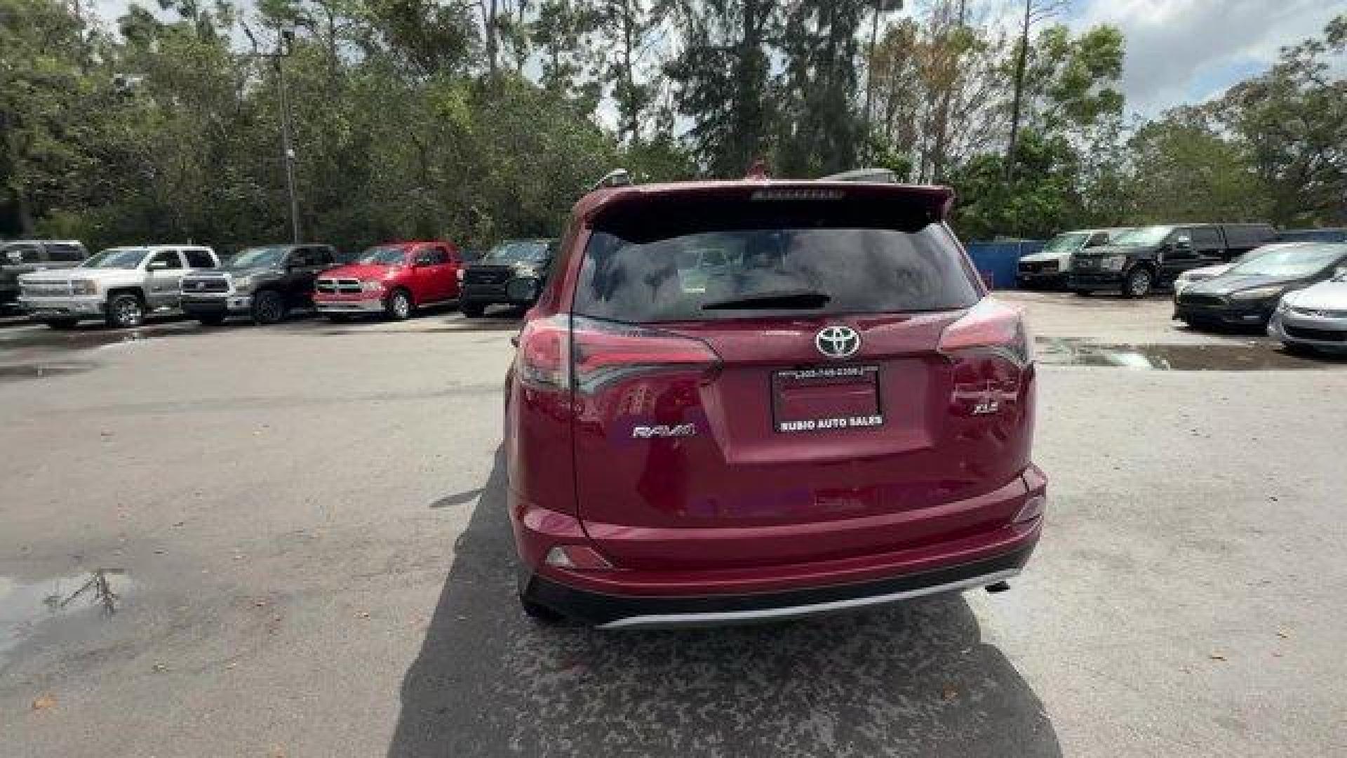 2018 Red Toyota RAV4 (2T3WFREV7JW) with an 4 2.5 L engine, Automatic transmission, located at 27610 S Dixie Hwy, Homestead, FL, 33032, (305) 749-2348, 25.510241, -80.438301 - KBB.com 10 Best SUVs Under $25,000. Delivers 30 Highway MPG and 23 City MPG! This Toyota RAV4 delivers a Regular Unleaded I-4 2.5 L/152 engine powering this Automatic transmission. Variable Intermittent Wipers, Trip Computer, Transmission: 6-Speed Automatic.*This Toyota RAV4 Comes Equipped with Thes - Photo#3