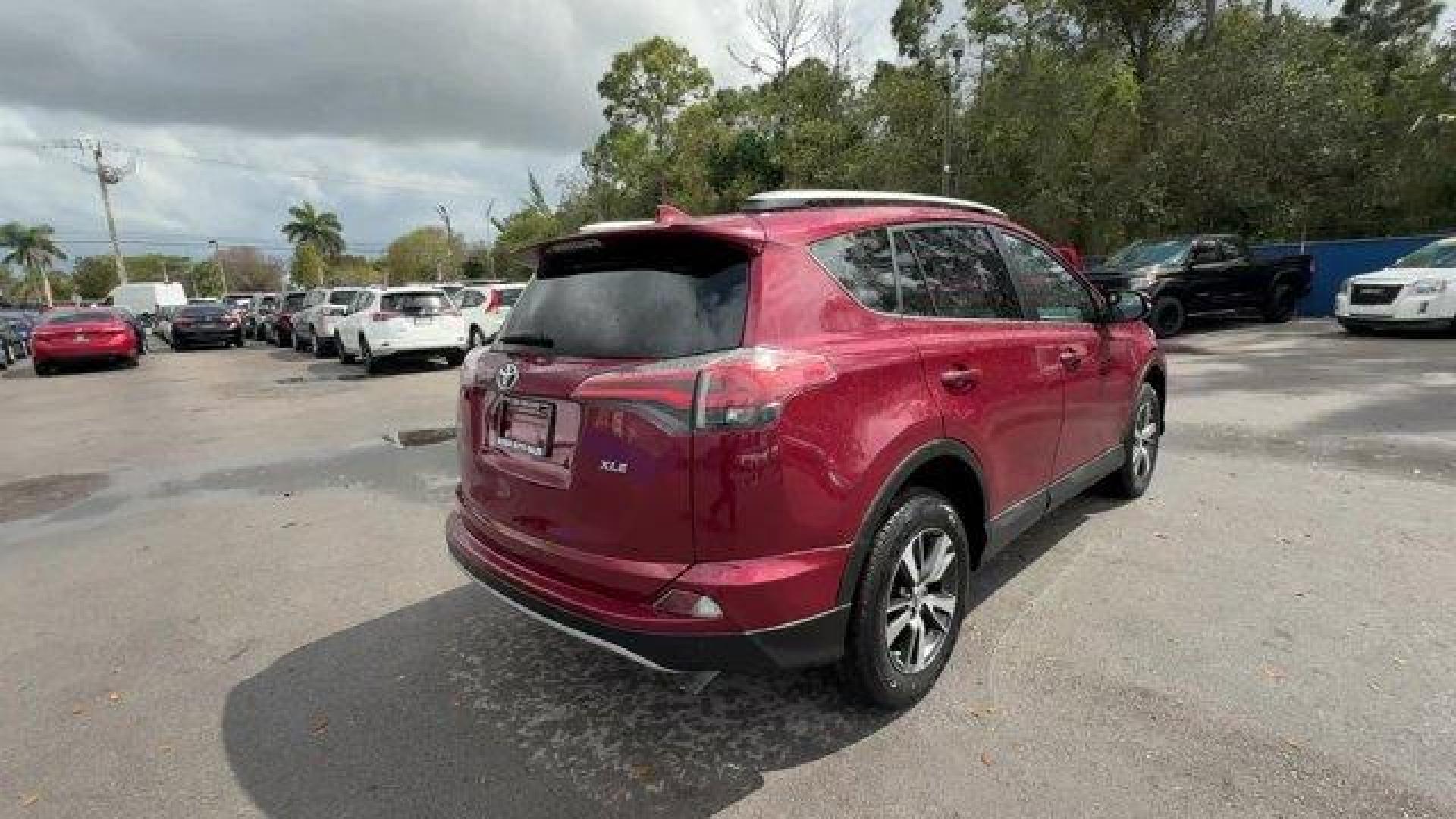 2018 Red Toyota RAV4 (2T3WFREV7JW) with an 4 2.5 L engine, Automatic transmission, located at 27610 S Dixie Hwy, Homestead, FL, 33032, (305) 749-2348, 25.510241, -80.438301 - KBB.com 10 Best SUVs Under $25,000. Delivers 30 Highway MPG and 23 City MPG! This Toyota RAV4 delivers a Regular Unleaded I-4 2.5 L/152 engine powering this Automatic transmission. Variable Intermittent Wipers, Trip Computer, Transmission: 6-Speed Automatic.*This Toyota RAV4 Comes Equipped with Thes - Photo#4