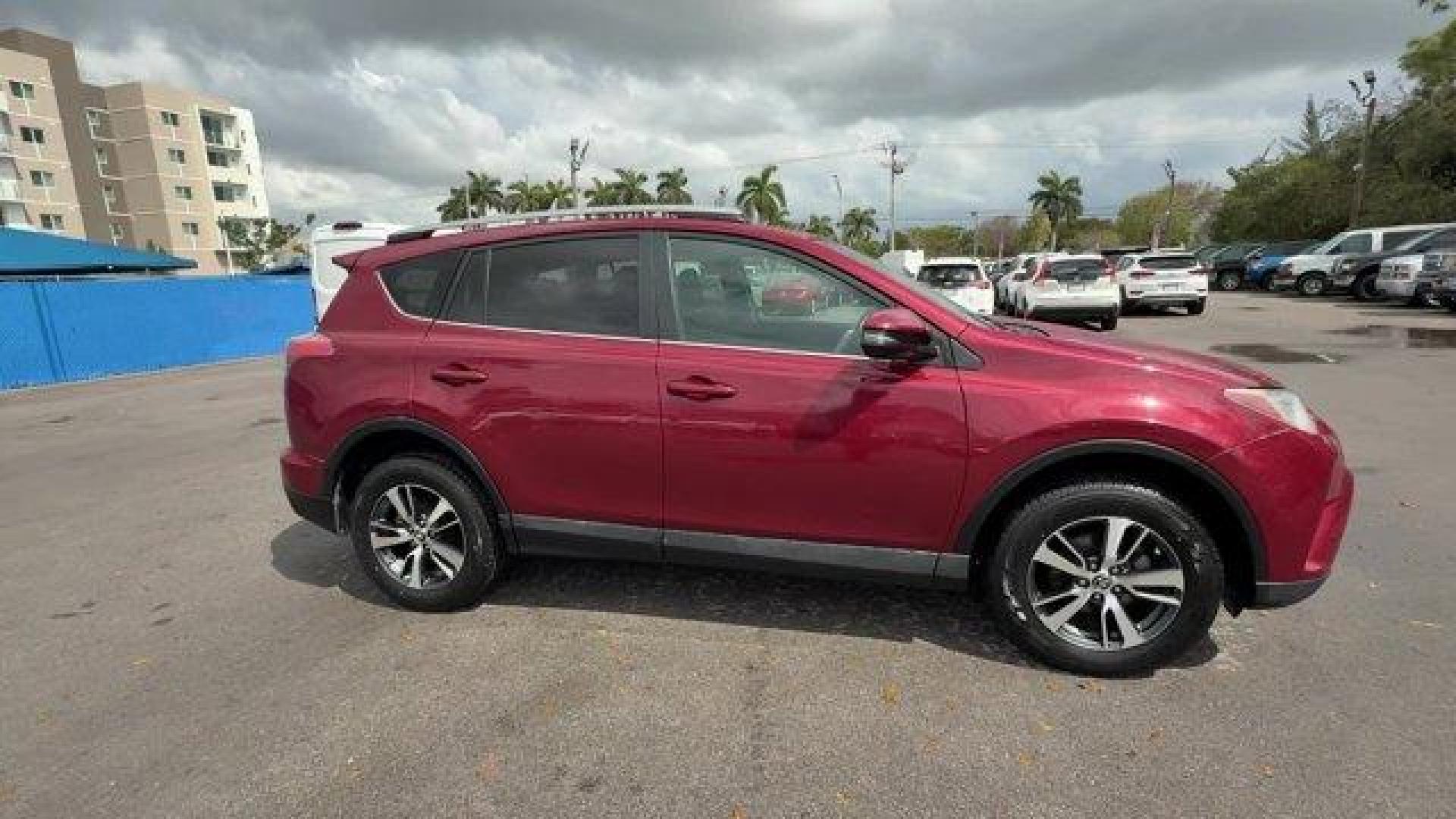 2018 Red Toyota RAV4 (2T3WFREV7JW) with an 4 2.5 L engine, Automatic transmission, located at 27610 S Dixie Hwy, Homestead, FL, 33032, (305) 749-2348, 25.510241, -80.438301 - KBB.com 10 Best SUVs Under $25,000. Delivers 30 Highway MPG and 23 City MPG! This Toyota RAV4 delivers a Regular Unleaded I-4 2.5 L/152 engine powering this Automatic transmission. Variable Intermittent Wipers, Trip Computer, Transmission: 6-Speed Automatic.*This Toyota RAV4 Comes Equipped with Thes - Photo#5