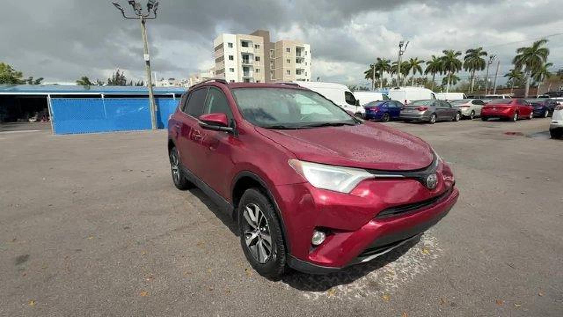 2018 Red Toyota RAV4 (2T3WFREV7JW) with an 4 2.5 L engine, Automatic transmission, located at 27610 S Dixie Hwy, Homestead, FL, 33032, (305) 749-2348, 25.510241, -80.438301 - KBB.com 10 Best SUVs Under $25,000. Delivers 30 Highway MPG and 23 City MPG! This Toyota RAV4 delivers a Regular Unleaded I-4 2.5 L/152 engine powering this Automatic transmission. Variable Intermittent Wipers, Trip Computer, Transmission: 6-Speed Automatic.*This Toyota RAV4 Comes Equipped with Thes - Photo#6
