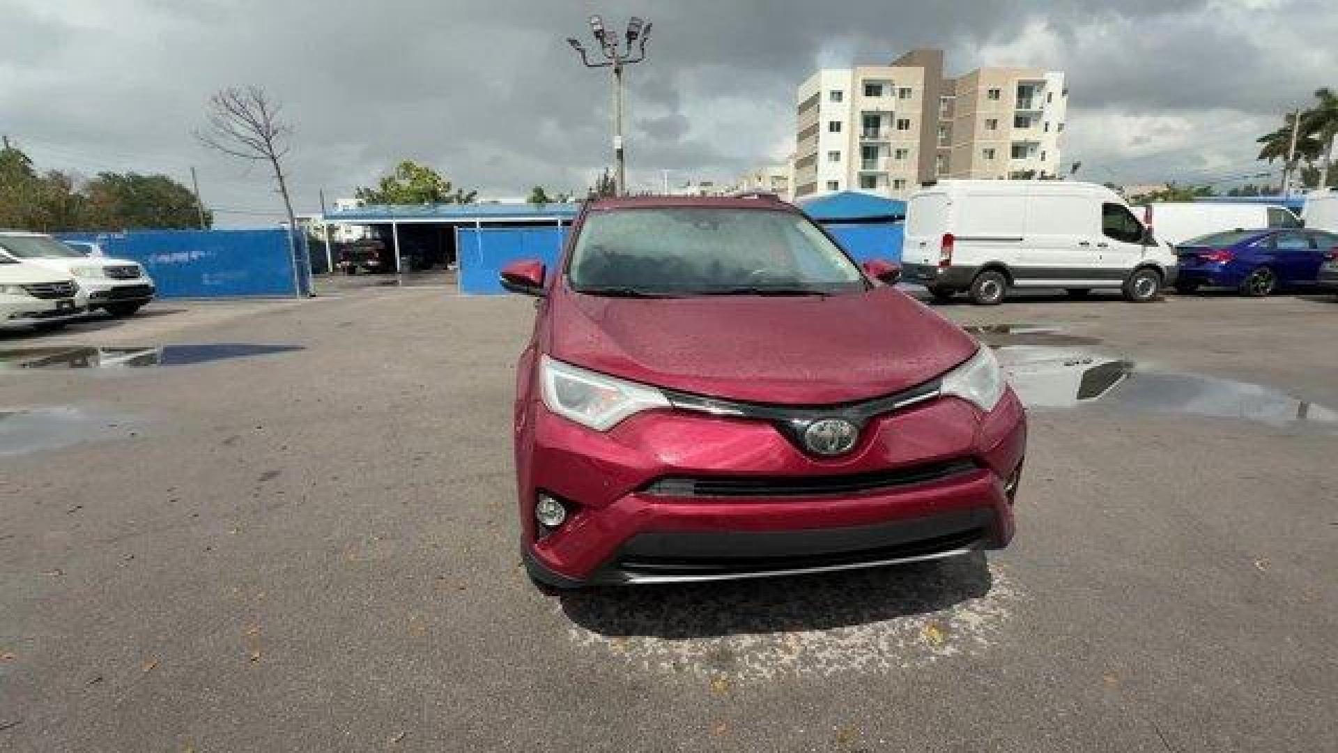2018 Red Toyota RAV4 (2T3WFREV7JW) with an 4 2.5 L engine, Automatic transmission, located at 27610 S Dixie Hwy, Homestead, FL, 33032, (305) 749-2348, 25.510241, -80.438301 - KBB.com 10 Best SUVs Under $25,000. Delivers 30 Highway MPG and 23 City MPG! This Toyota RAV4 delivers a Regular Unleaded I-4 2.5 L/152 engine powering this Automatic transmission. Variable Intermittent Wipers, Trip Computer, Transmission: 6-Speed Automatic.*This Toyota RAV4 Comes Equipped with Thes - Photo#7