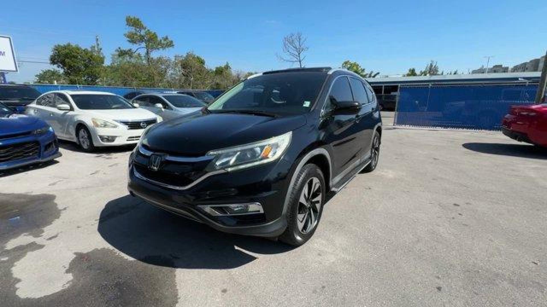 2015 Black Honda CR-V (5J6RM3H94FL) with an 4 2.4 L engine, Variable transmission, located at 27610 S Dixie Hwy, Homestead, FL, 33032, (305) 749-2348, 25.510241, -80.438301 - ALG Residual Value Awards, Residual Value Awards. Boasts 34 Highway MPG and 27 City MPG! This Honda CR-V boasts a Regular Unleaded I-4 2.4 L/144 engine powering this Variable transmission. Wheels: 18 Alloy, Valet Function, Trunk/Hatch Auto-Latch.*This Honda CR-V Comes Equipped with These Options *Tr - Photo#0