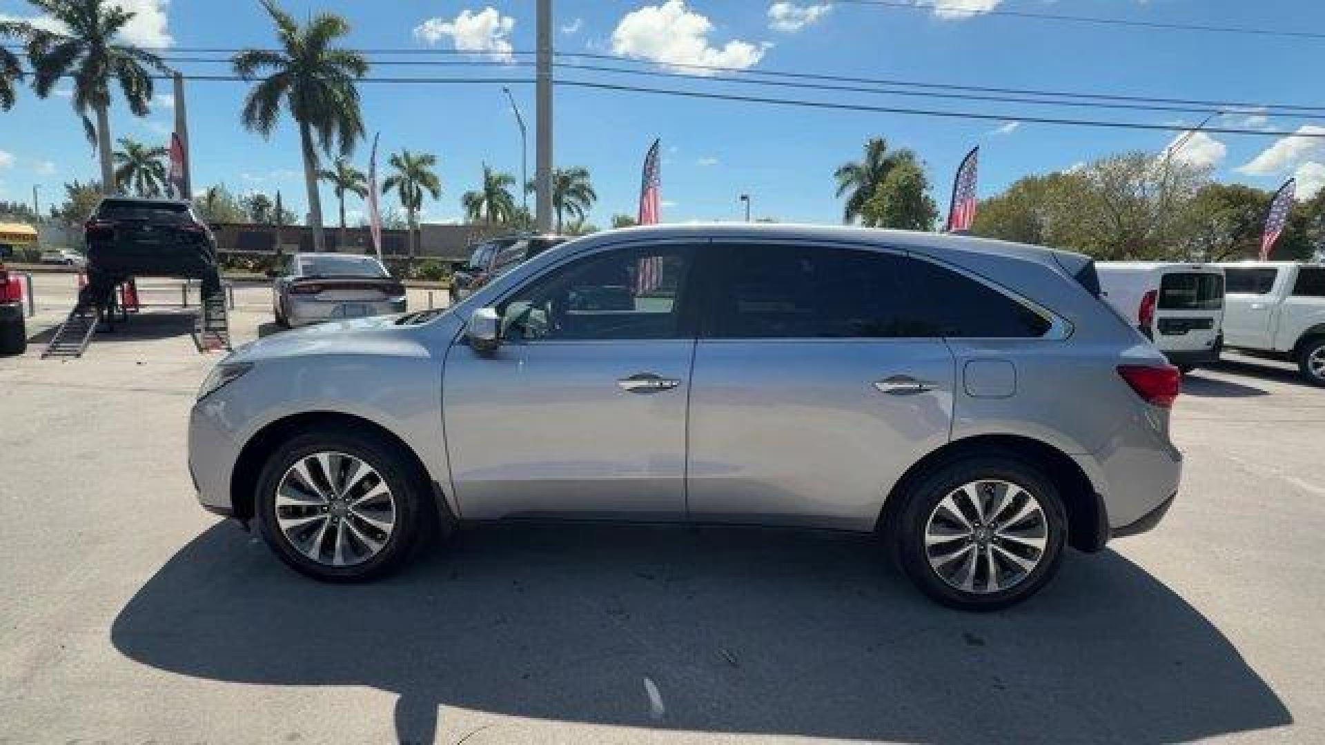2016 Silver Acura MDX (5FRYD4H41GB) with an 6 3.5 L engine, Automatic transmission, located at 27610 S Dixie Hwy, Homestead, FL, 33032, (305) 749-2348, 25.510241, -80.438301 - KBB.com Best Buy Awards Finalist. Delivers 26 Highway MPG and 18 City MPG! This Acura MDX delivers a Premium Unleaded V-6 3.5 L/212 engine powering this Automatic transmission. Window Grid Antenna, Wheels: 19 x 8.0 Machine Finished Aluminum Alloy, Voice Activated Dual Zone Front Automatic Air Condit - Photo#1