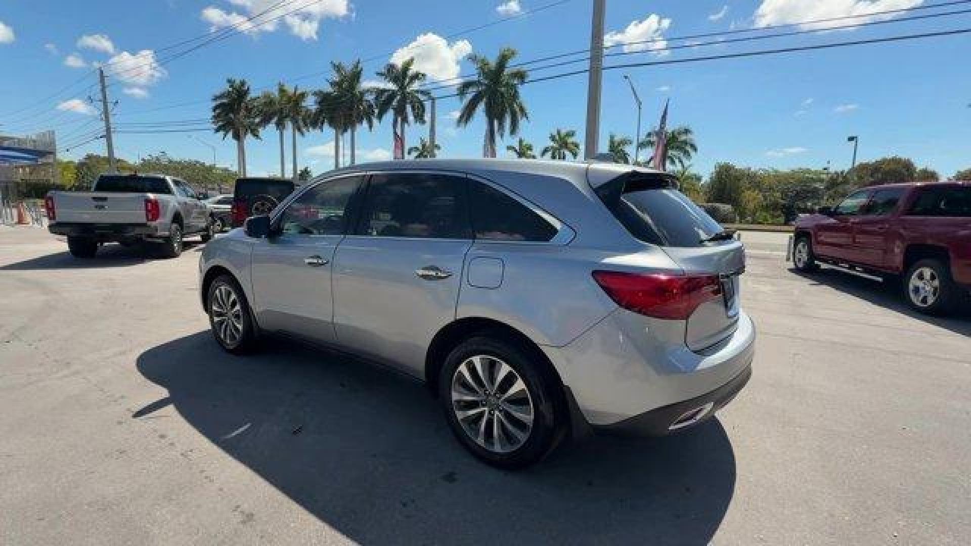 2016 Silver Acura MDX (5FRYD4H41GB) with an 6 3.5 L engine, Automatic transmission, located at 27610 S Dixie Hwy, Homestead, FL, 33032, (305) 749-2348, 25.510241, -80.438301 - KBB.com Best Buy Awards Finalist. Delivers 26 Highway MPG and 18 City MPG! This Acura MDX delivers a Premium Unleaded V-6 3.5 L/212 engine powering this Automatic transmission. Window Grid Antenna, Wheels: 19 x 8.0 Machine Finished Aluminum Alloy, Voice Activated Dual Zone Front Automatic Air Condit - Photo#2
